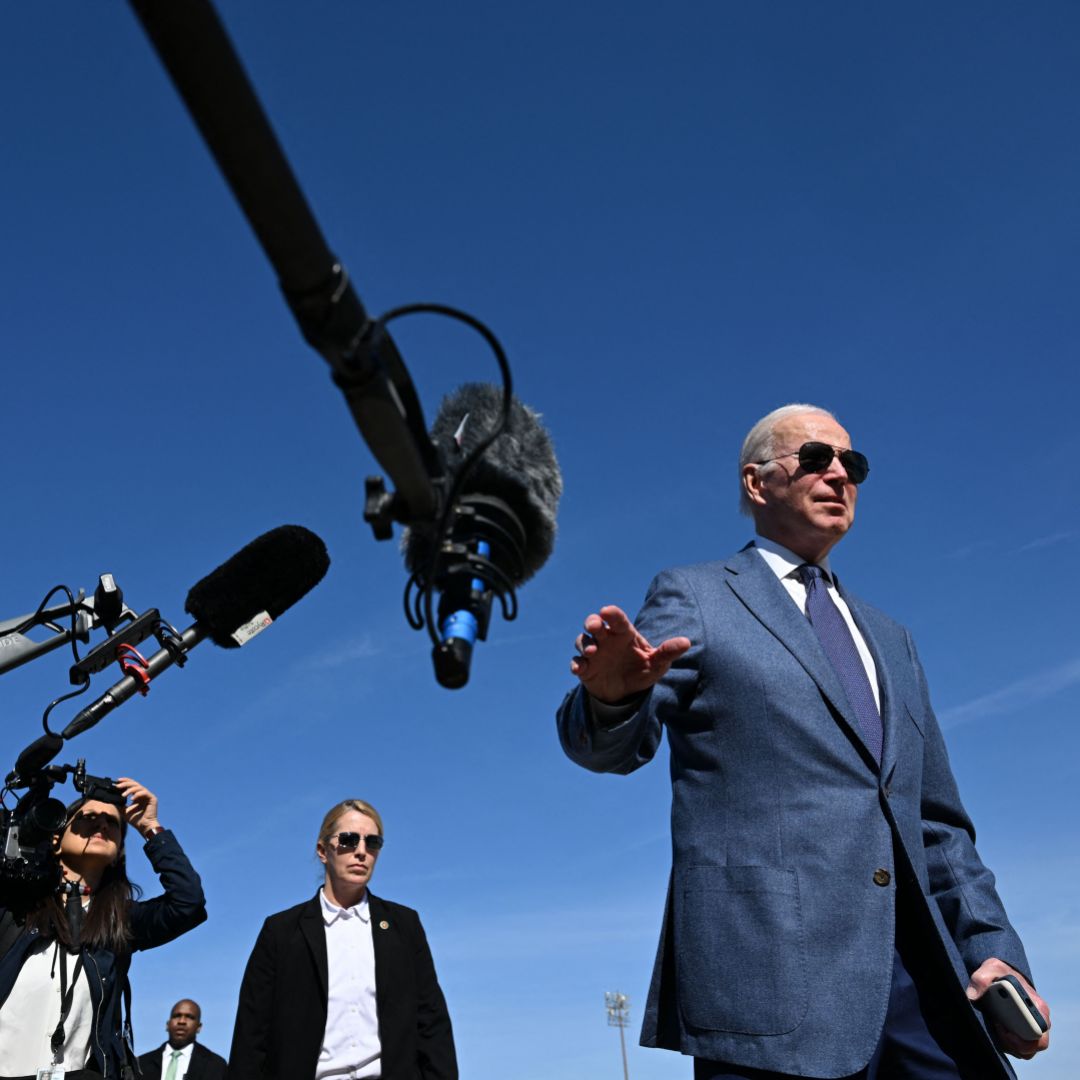 U.S. President Joe Biden speaks with the press before boarding Air Force One, as he departs for Northern Ireland, at Joint Base Andrews in Maryland on April 11, 2023. 