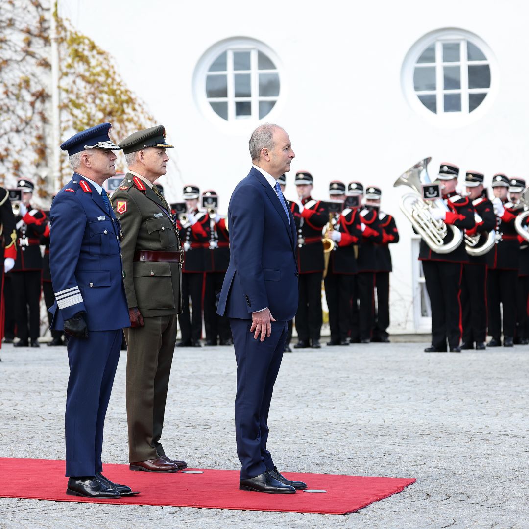 Ireland's foreign minister Micheal Martin (right), Irish Defence Forces chief Sean Clancy (left) and Brigadier General Tony Cudmore (center) meet Irish President Michael D. Higgins in Dublin, Ireland, on April 13, 2023. 