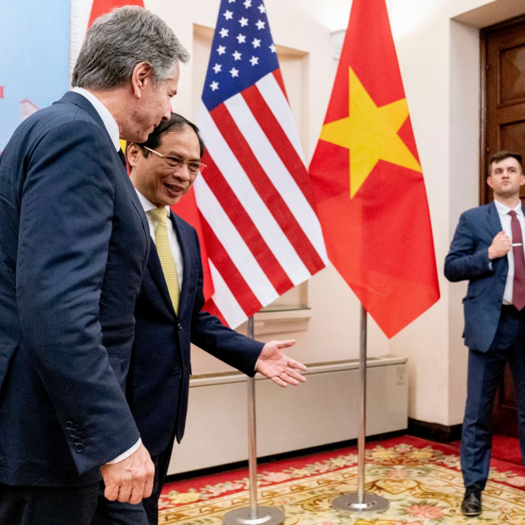 U.S. Secretary of State Antony Blinken (left) shakes hands with Vietnamese Foreign Minister Bui Thanh Son before their meeting at the Government Guest House in Hanoi on April 15, 2023. 