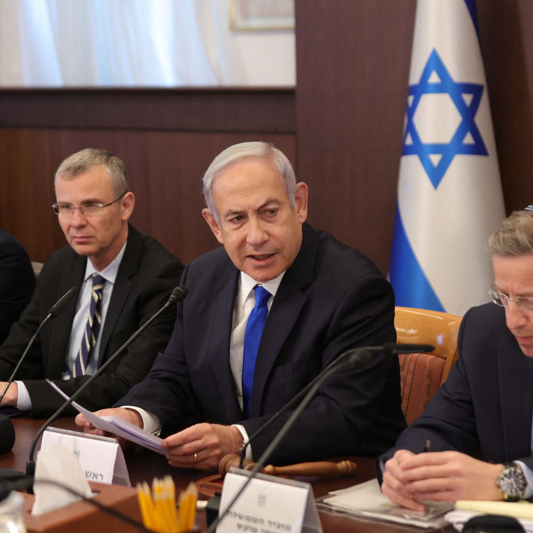 Israeli Prime Minister Benjamin Netanyahu (second from right) attends the weekly cabinet meeting in his office in Jerusalem on June 25, 2023. 