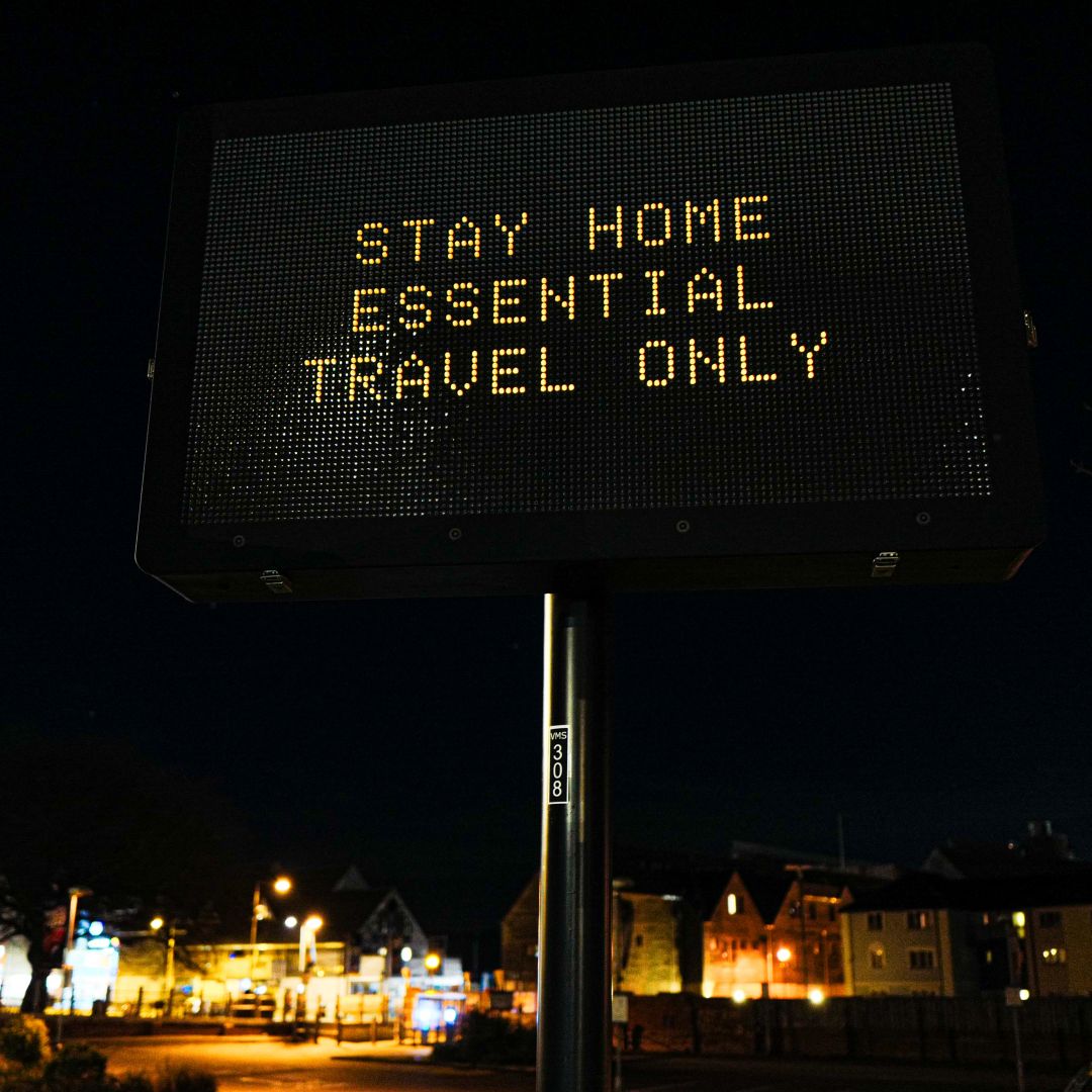 A sign advises people to follow COVID-19 restrictions on Jan. 5, 2021, in Falmouth, the United Kingdom. In a televised address on Jan. 4, U.K. Prime Minister Boris Johnson announced the country was entering its third lockdown since the onset of the pandemic in early 2020. 
