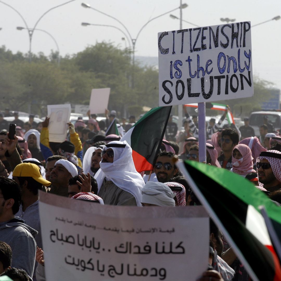 Members of Kuwait’s stateless Bidoon community protest to demand citizenship and other rights in Jahra, northwest of Kuwait City, in December 2011. 