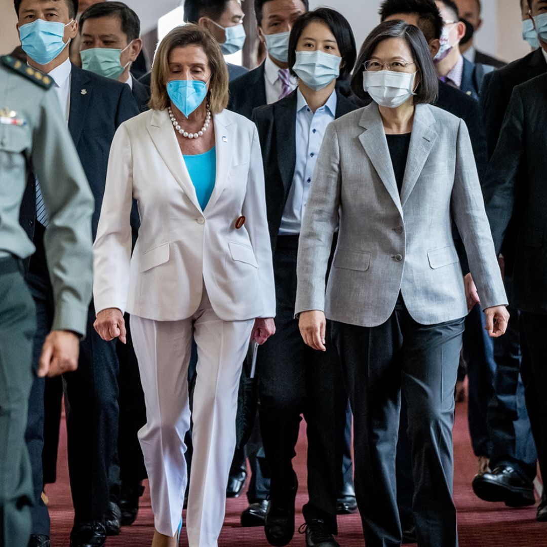 Then-U.S. House Speaker Nancy Pelosi (center left) walks alongside Taiwanese President Tsai Ing-wen after arriving at the president's office in Taipei on Aug. 3, 2022. Then-U.S. House Speaker Nancy Pelosi (center left) walks alongside Taiwanese President Tsai Ing-wen after arriving at the president's office in Taipei on Aug. 3, 2022.