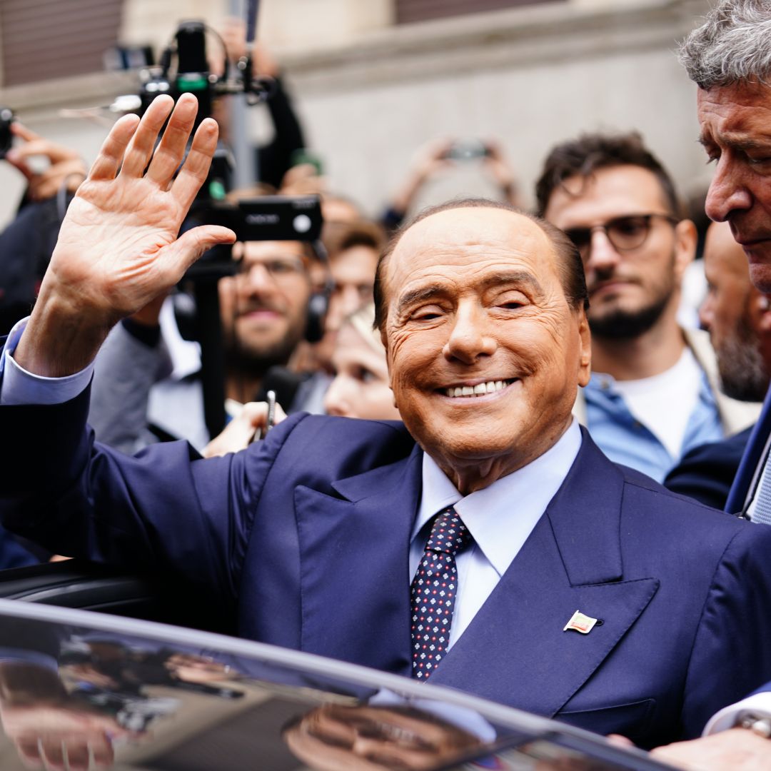 Silvio Berlusconi leaves a polling station after voting in Italy's September 2022 snap election. The former prime minister died on June 12, 2023, at the age of 86.