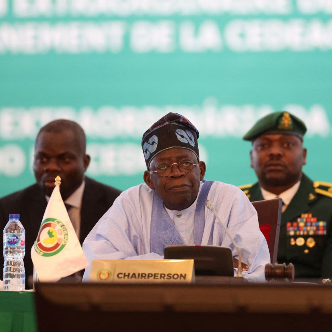 Nigerian President Bola Ahmed Tinubu, who also serves as the chairman of the Economic Community of West African States (ECOWAS), participates in an emergency ECOWAS meeting on July 30, 2023, following the recent coup in Niger.