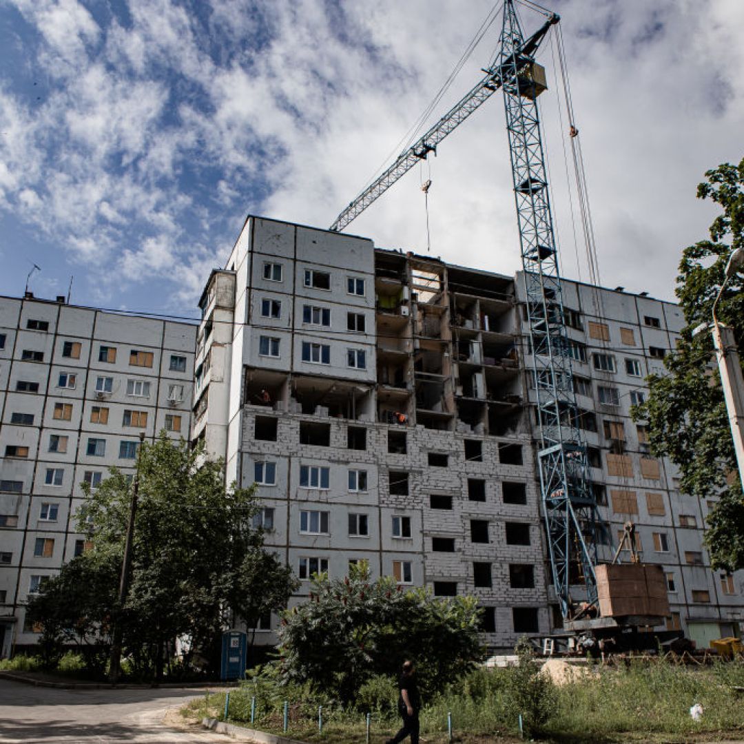 City authorities and businesses rebuild residential buildings damaged by Russian shelling in Kharkiv, Ukraine, on July 12, 2023. City authorities and businesses rebuild residential buildings damaged by Russian shelling in Kharkiv, Ukraine, on July 12, 2023.
