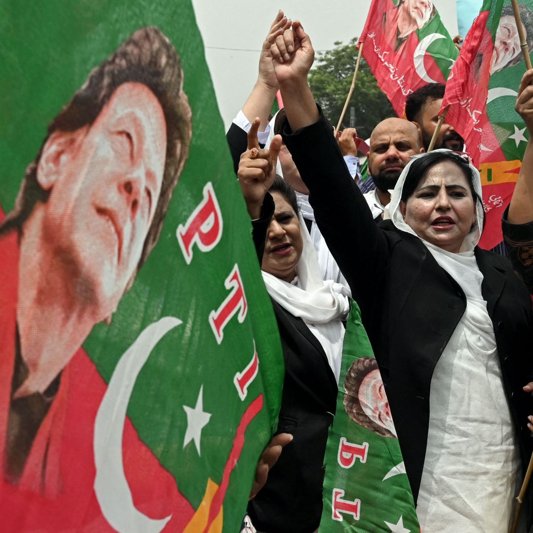 Supporters of former Pakistani Prime Minister Imran Khan denounce his arrest during a protest in Lahore on Aug. 7, 2023.