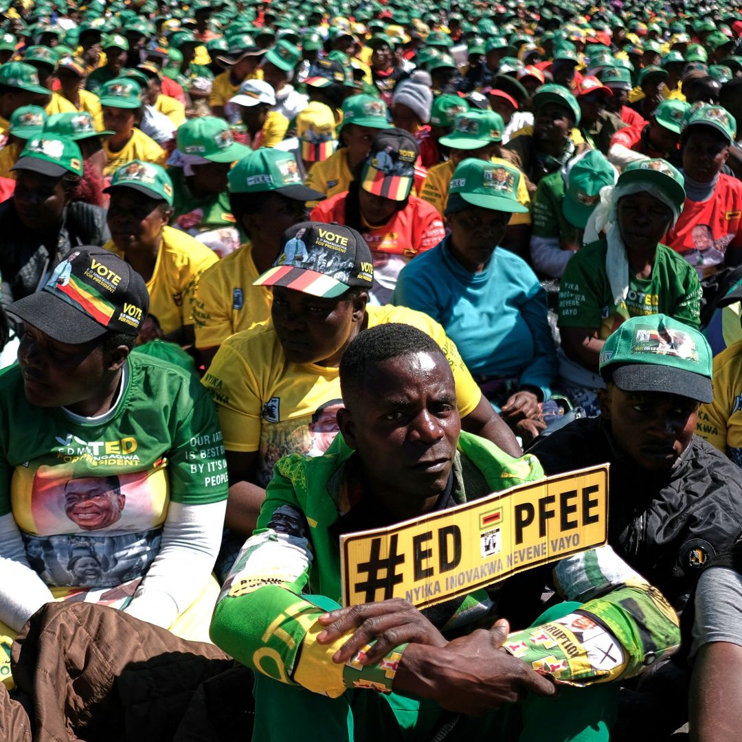 Supporters of Zimbabwe's ruling ZANU-PF party attend a campaign rally in Harare, Zimbabwe on Aug. 9, 2023. 