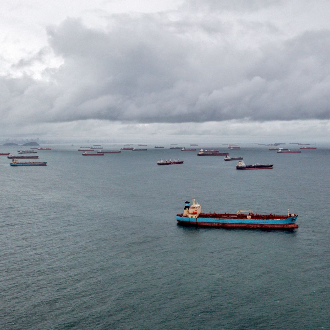 Cargo ships waiting to enter the Panama Canal are seen off the coast of Panama City on Aug. 23, 2023. 