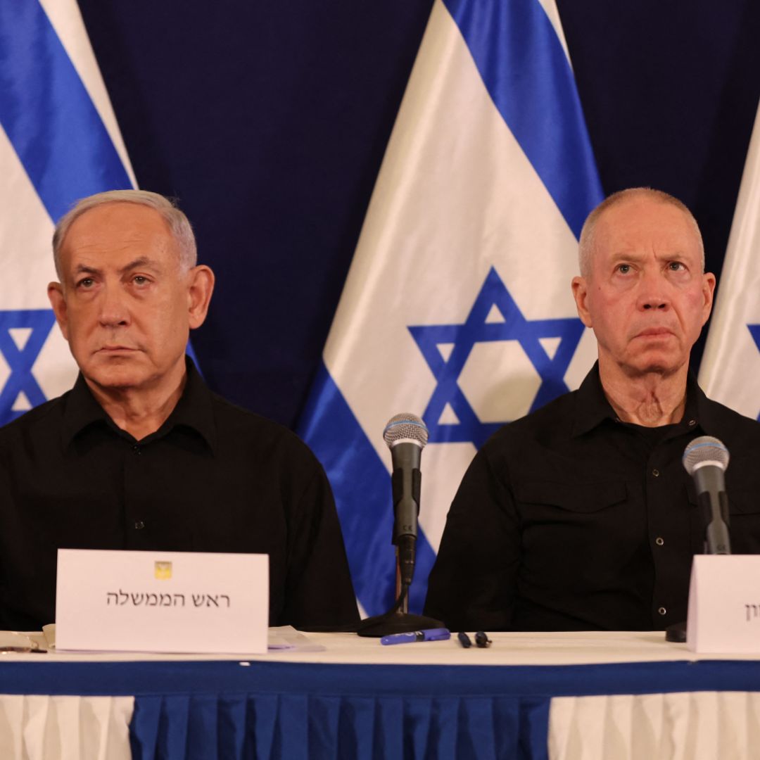 Israeli Prime Minister Benjamin Netanyahu (left) and Defence Minister Yoav Gallant attend a press conference in the Kirya military base in Tel Aviv on Oct. 28, 2023, amid ongoing battles between Israel and the Palestinian group Hamas. 