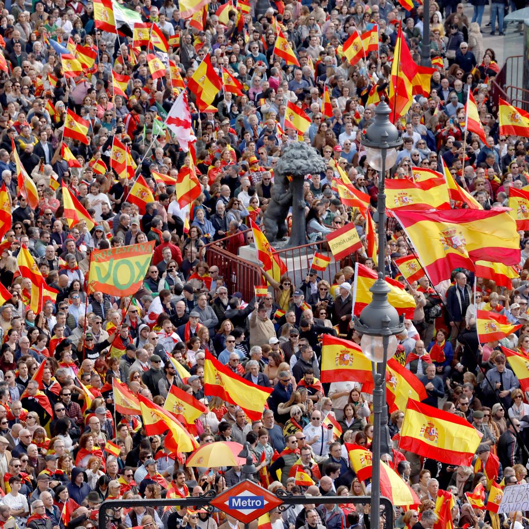 Demonstrators hold Spanish flags during a protest called by the country’s far-right Vox party in Madrid, Spain, on Nov. 12, 2023. 