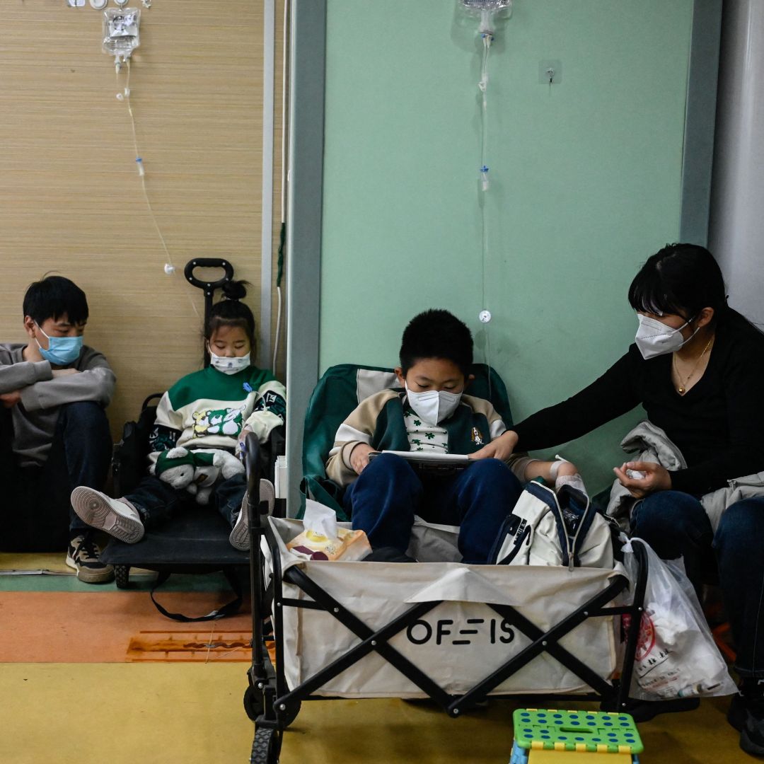 Children receive a drip at a children's hospital in Beijing, China, on Nov. 23, 2023, the same day the World Health Organization asked China for more data on a respiratory illness spreading in the north of the country. Children receive a drip at a children's hospital in Beijing, China, on Nov. 23, 2023, the same day the World Health Organization asked China for more data on a respiratory illness spreading in the north of the country.