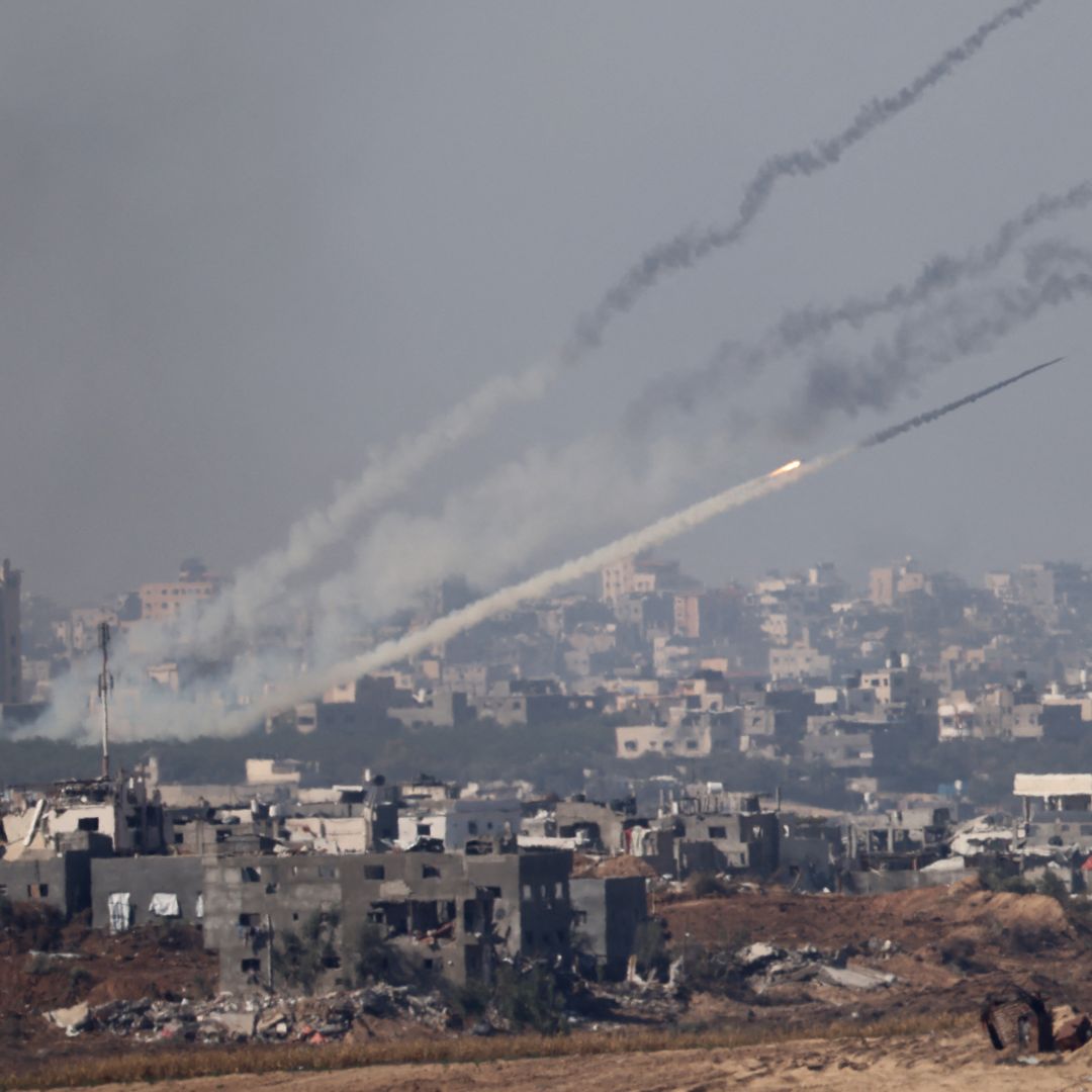 A photo taken from southern Israel near the border with the Gaza Strip shows a rocket being fired from inside Gaza toward Israel, as fighting resumed between the Israeli forces and Hamas militants after a temporary cease-fire expired on Dec. 1, 2023.