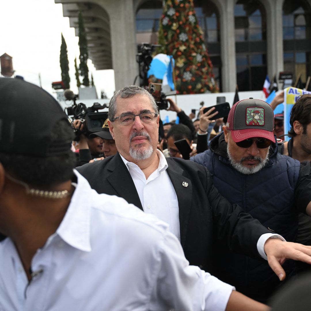 Guatemalan President-elect Bernardo Arevalo (center) takes part in a protest to demand the resignation of Attorney General Consuelo Porras and prosecutor Rafael Curruchiche, accused of generating an electoral crisis, in Guatemala City on Dec. 7, 2023. 