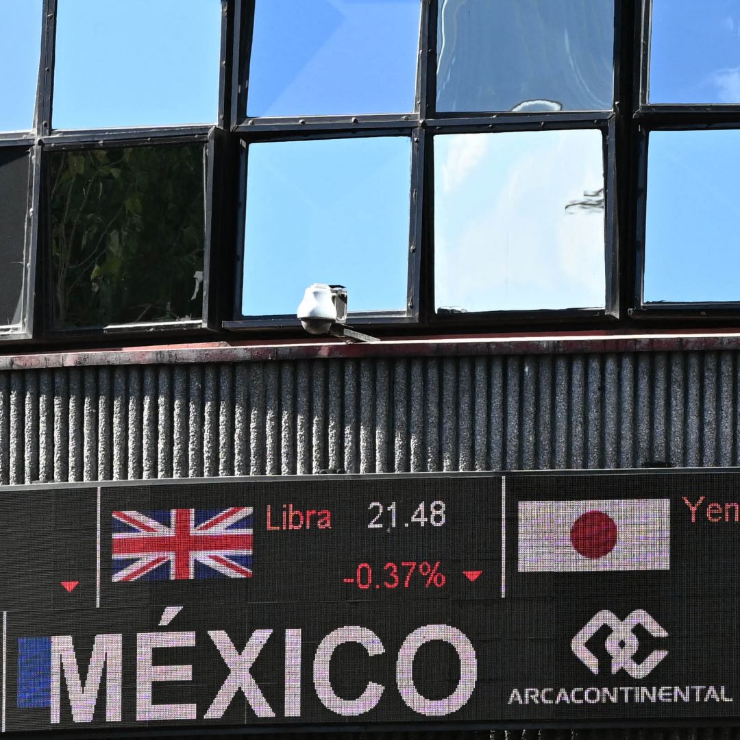 Different currency exchanges are seen outside the Mexican Stock Exchange building at Reforma Avenue in Mexico City on Jan. 5, 2024. 