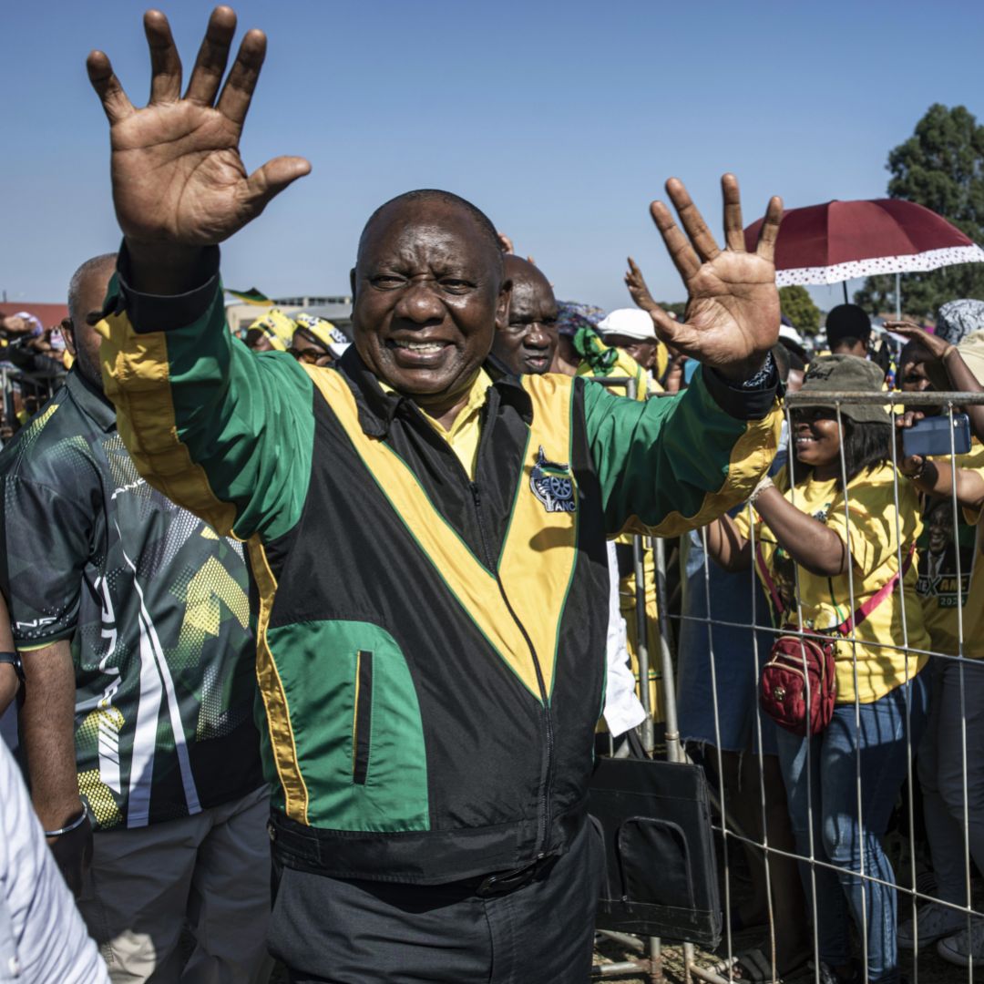 South African President Cyril Ramaphosa greets supporters during an election rally on May 17, 2024, at Lakhis Sports Ground in Greytown, KwaZulu-Natal, South Africa. 