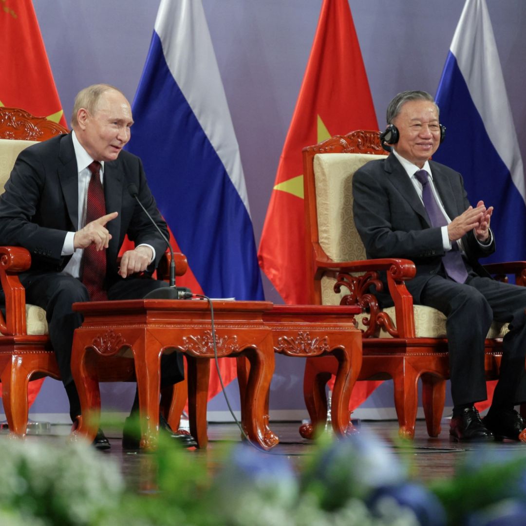 Russian President Vladimir Putin (left) and Vietnamese President To Lam attend an event in Hanoi, Vietnam, on June 20, 2024. 