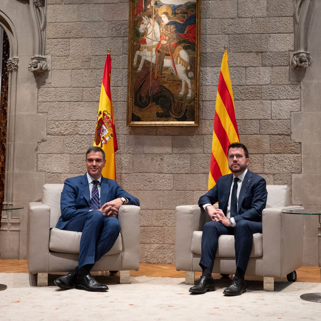 Spanish Prime Minister Pedro Sanchez (left) and Catalan regional president Pere Aragones (right) pose during their meeting at the Generalitat Palace in Barcelona on July 24, 2024. 