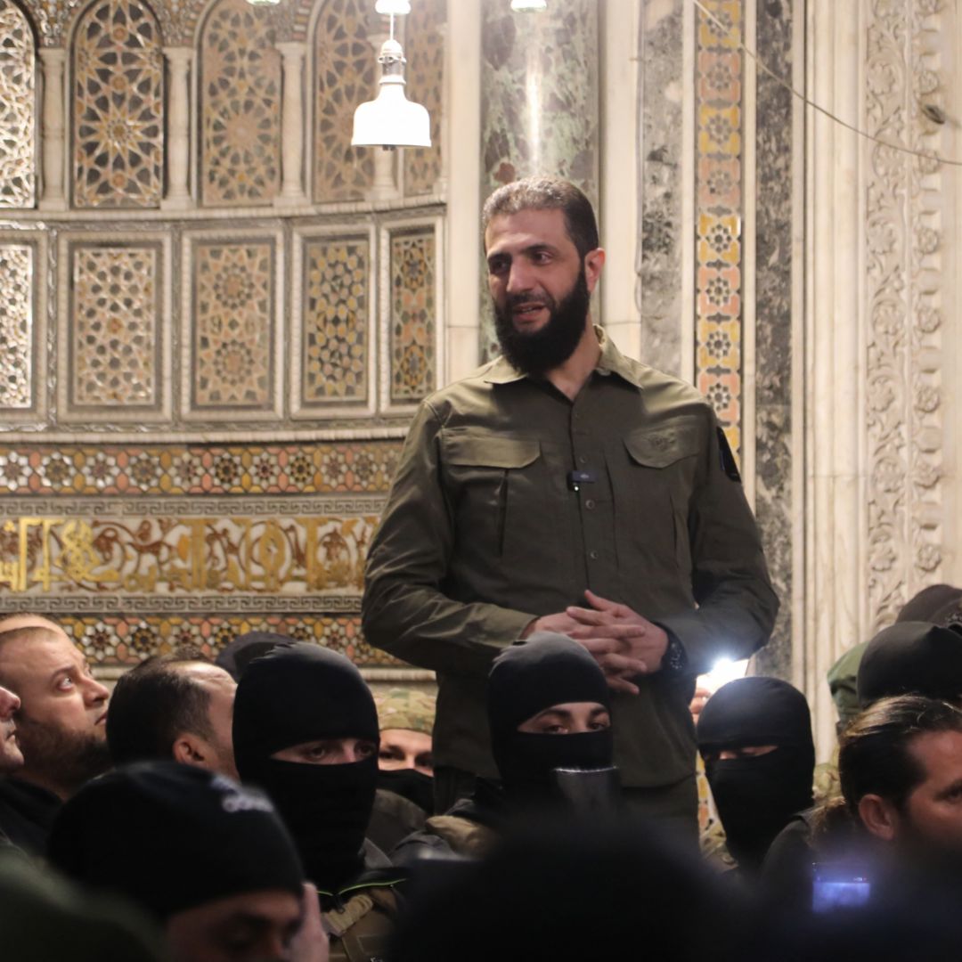 Syria’s de-facto leader Ahmad al-Sharaa addresses a crowd at a mosque in Damascus on Dec. 8, 2024.