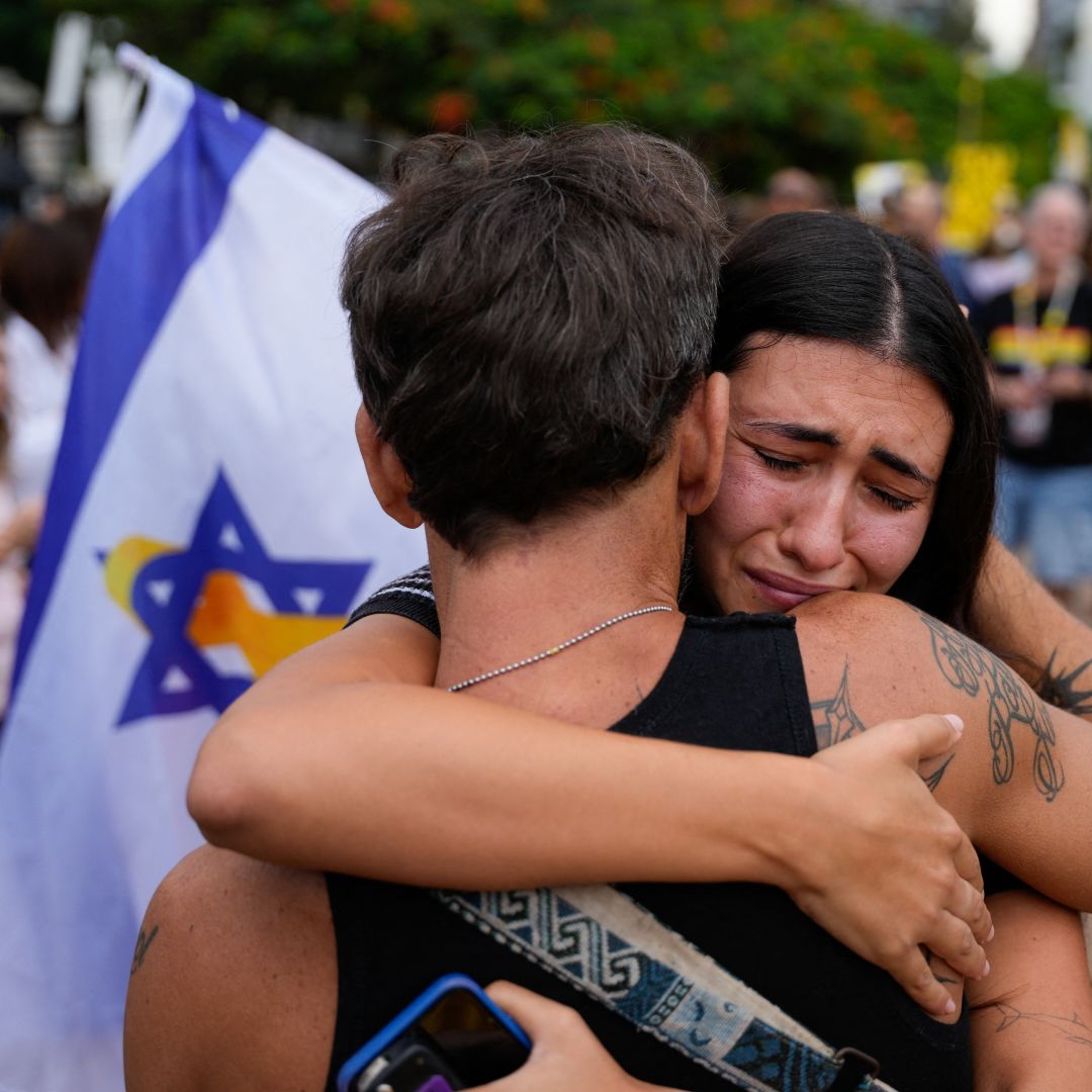 People react at Hostage Square in Tel Aviv on Oct. 9, 2025, following news of a new Gaza ceasefire deal. People react at Hostage Square in Tel Aviv on Oct. 9, 2025, following news of a new Gaza ceasefire deal.