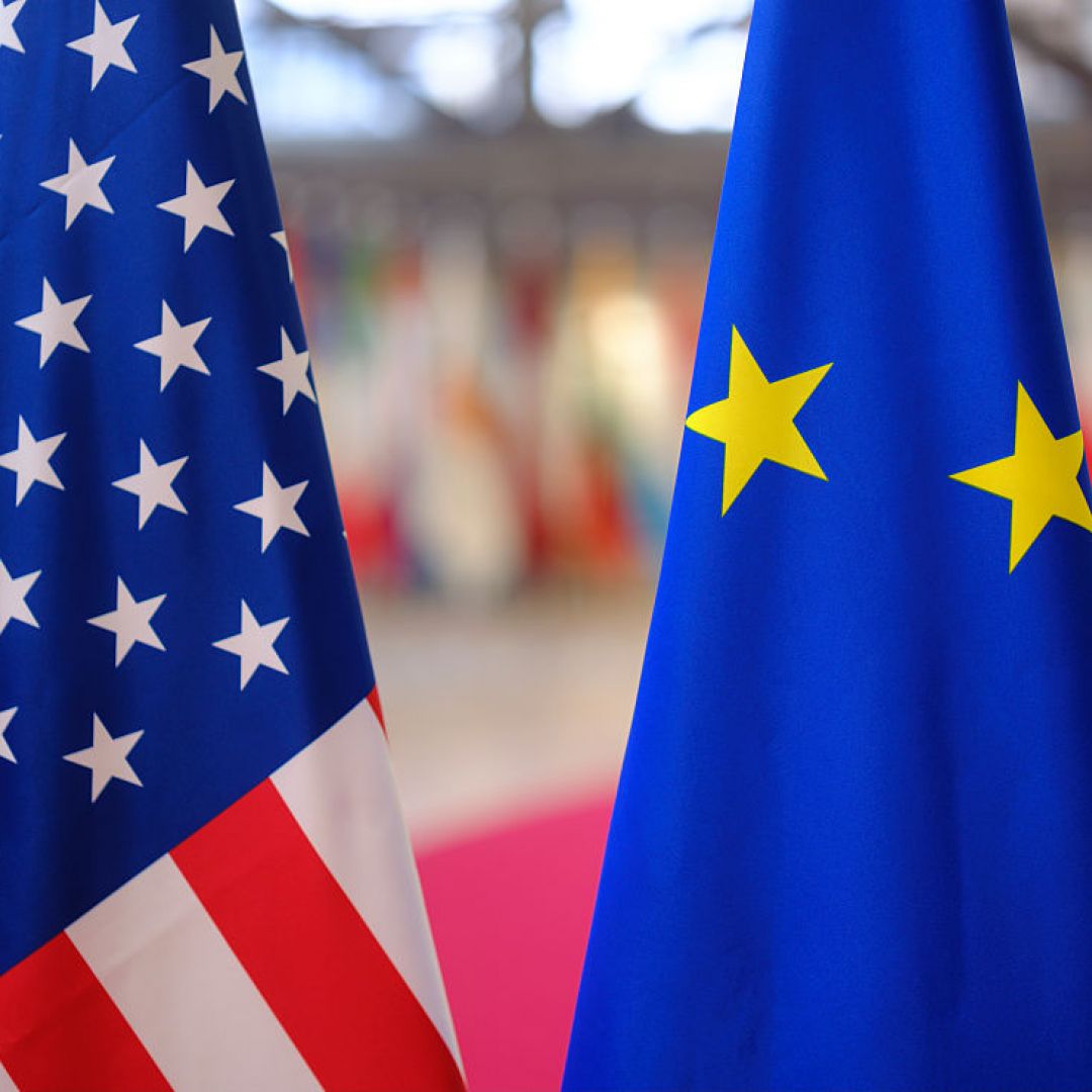 The U.S. and the EU flags are seen side by side on Nov. 21, 2025, in Brussels, Belgium. 