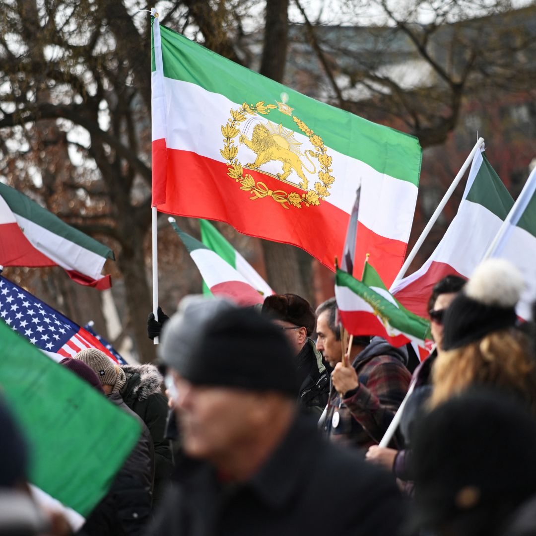 Activists hold Iranian flags in support of the ongoing protests in Iran during a rally in Washington, D.C., on Jan. 3, 2026. Activists hold Iranian flags in support of the ongoing protests in Iran during a rally in Washington, D.C., on Jan. 3, 2026.