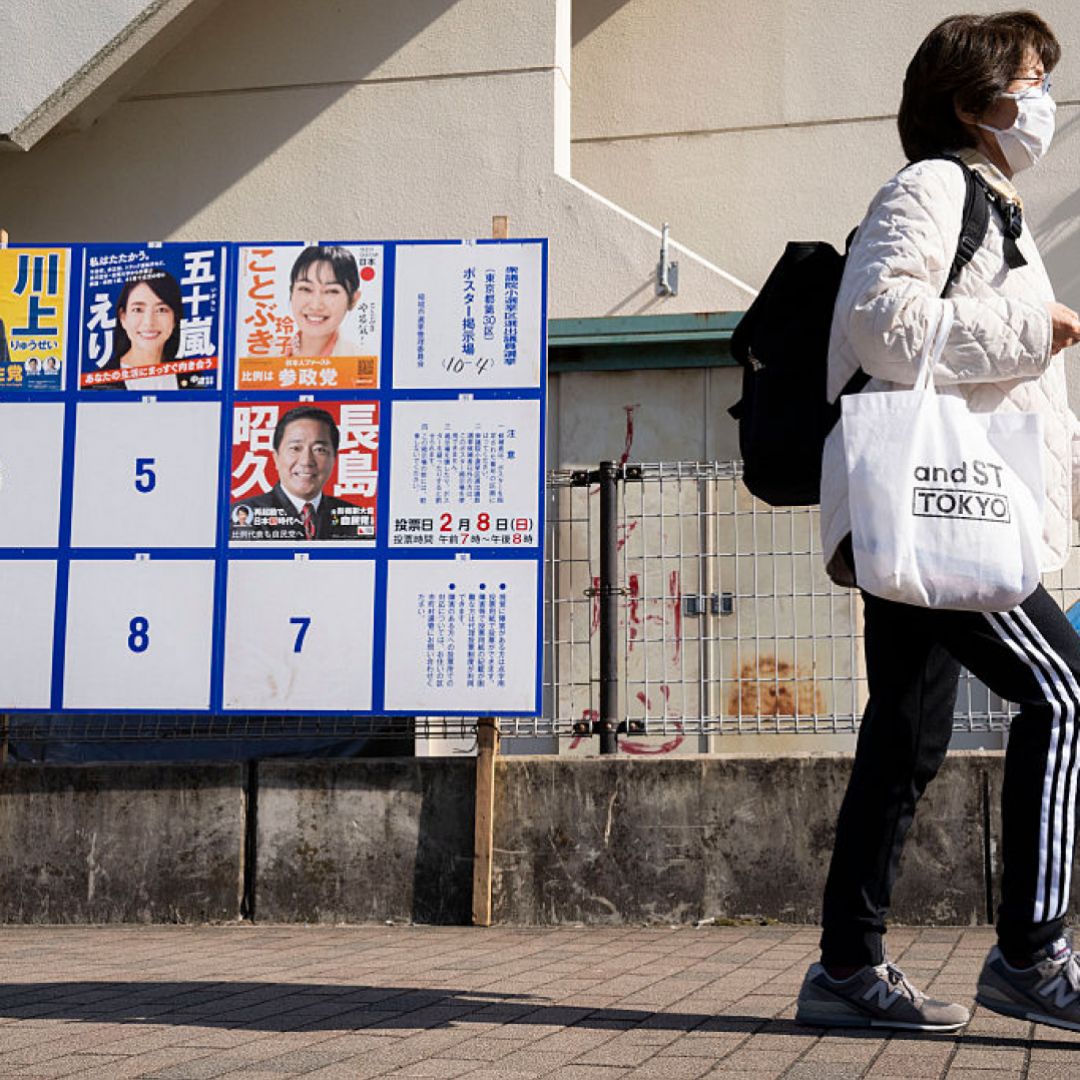 Campaign posters Feb. 6 of candidates running in the upcoming Japanese House of Representatives election, in Inagi, Tokyo prefecture.