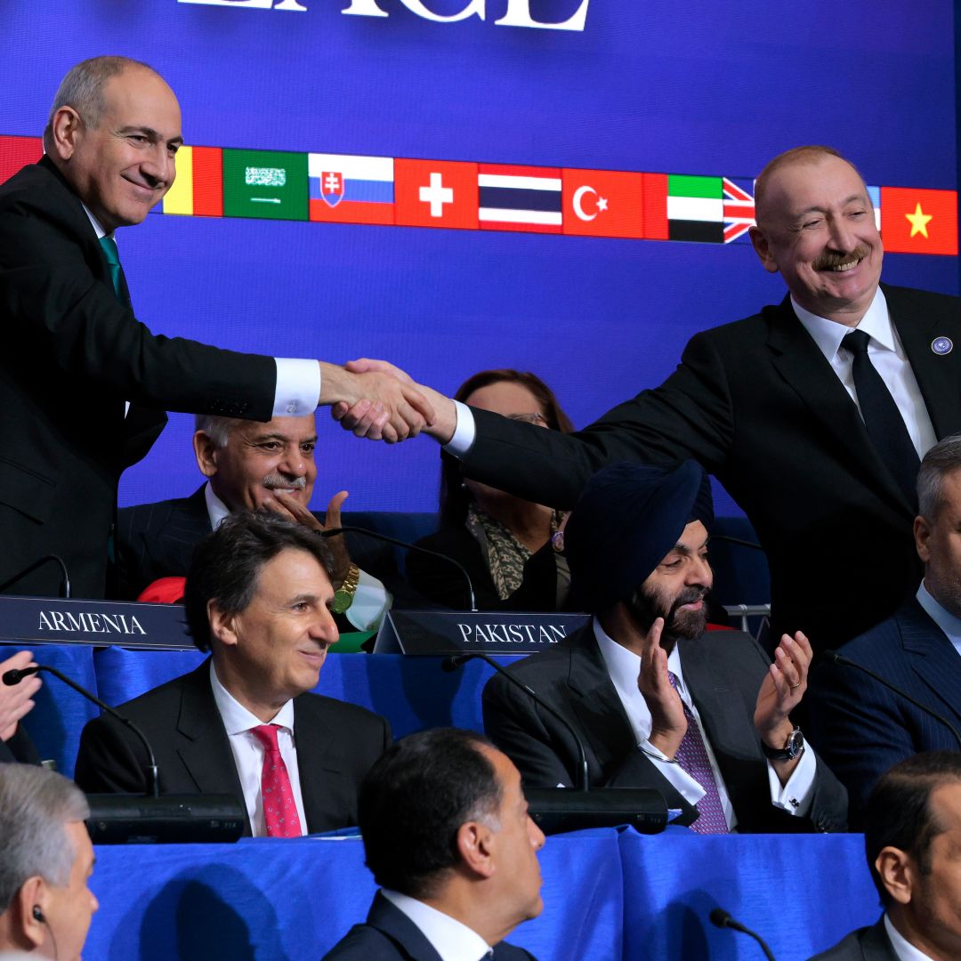 Armenian Prime Minister Nikol Pashinyan (left) shakes hands with Azerbaijani President Ilham Aliyev during the inaugural meeting of the Board of Peace at the Donald J. Trump Institute of Peace on Feb. 19, 2026, in Washington, D.C. Armenian Prime Minister Nikol Pashinyan (left) shakes hands with Azerbaijani President Ilham Aliyev during the inaugural meeting of the Board of Peace at the Donald J. Trump Institute of Peace on Feb. 19, 2026, in Washington, D.C.