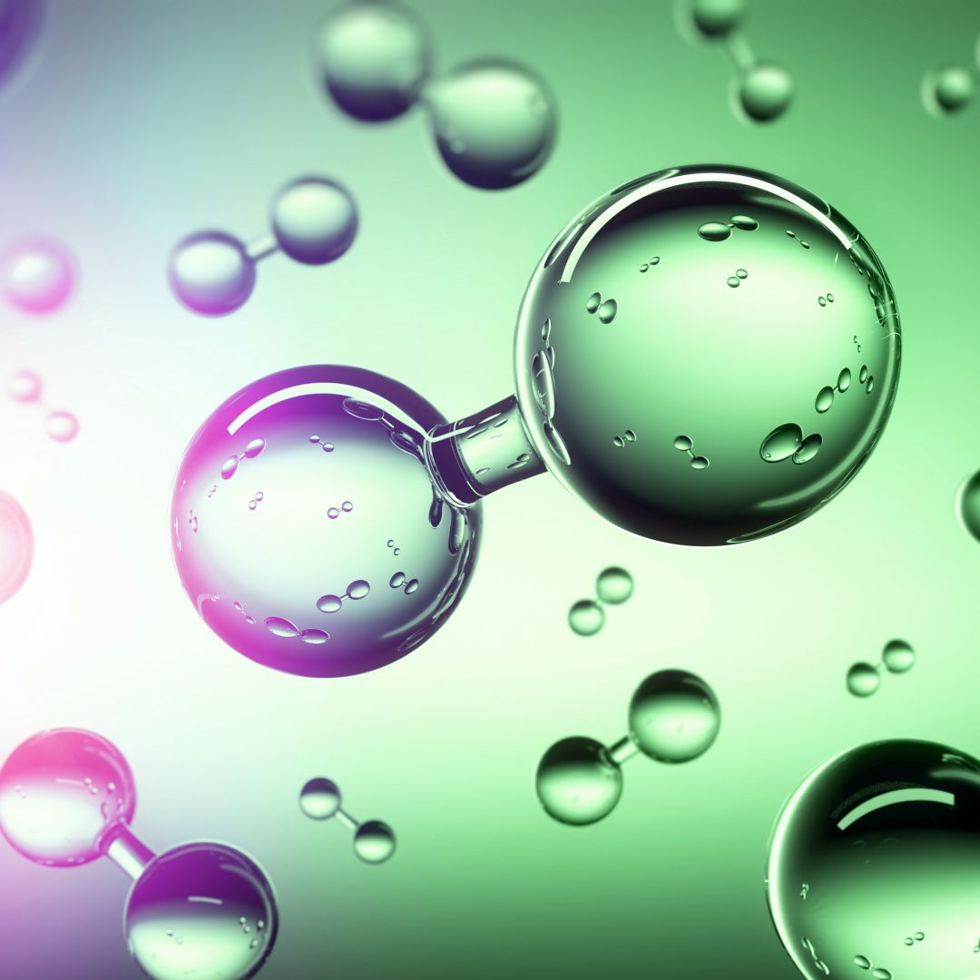 Glass-like molecules float against a green and purple background.