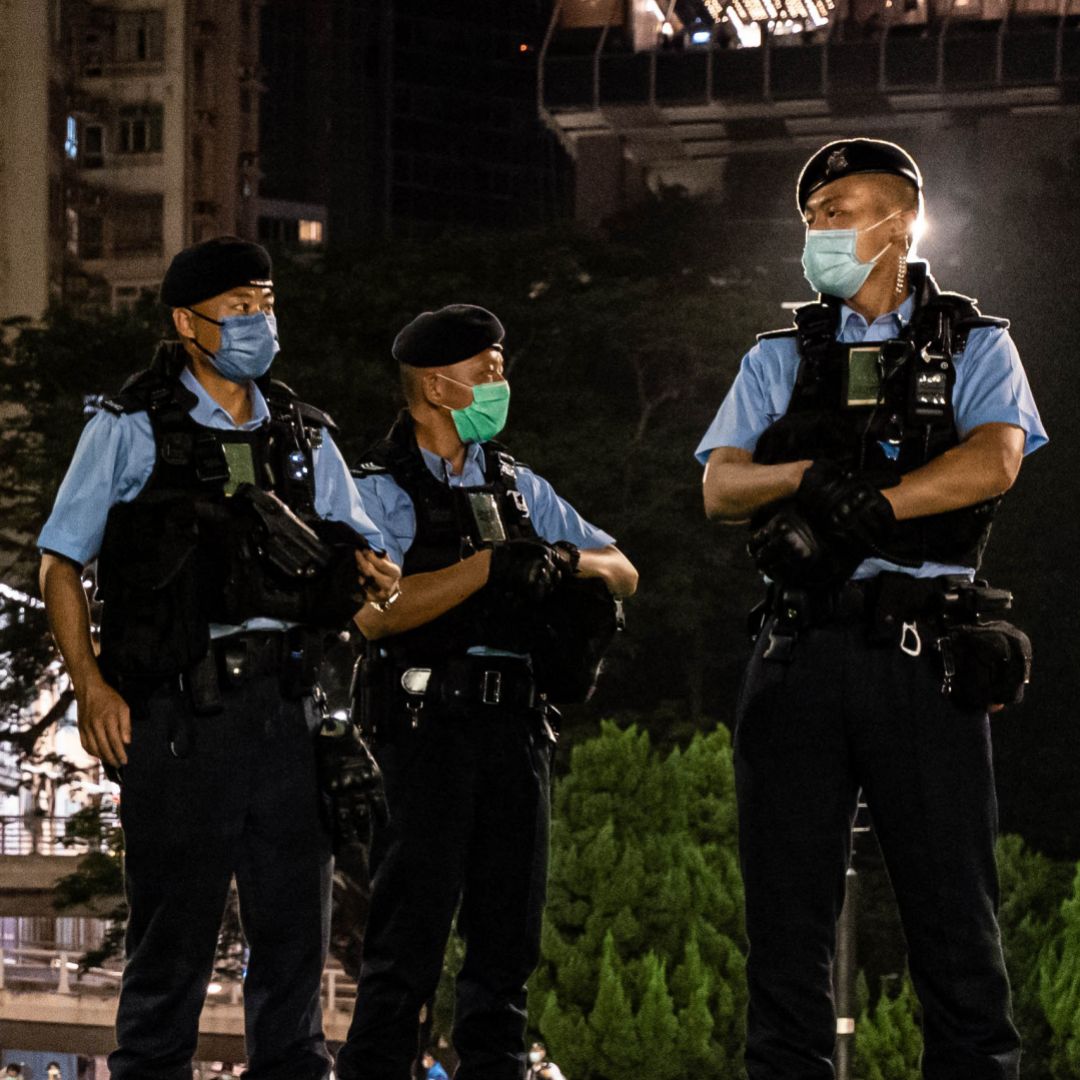 Police officers set up a cordon as they disperse the public out of Victoria Park ahead of the 33rd anniversary of the Tiananmen Square incident on June 3, 2022, in Hong Kong, China. 