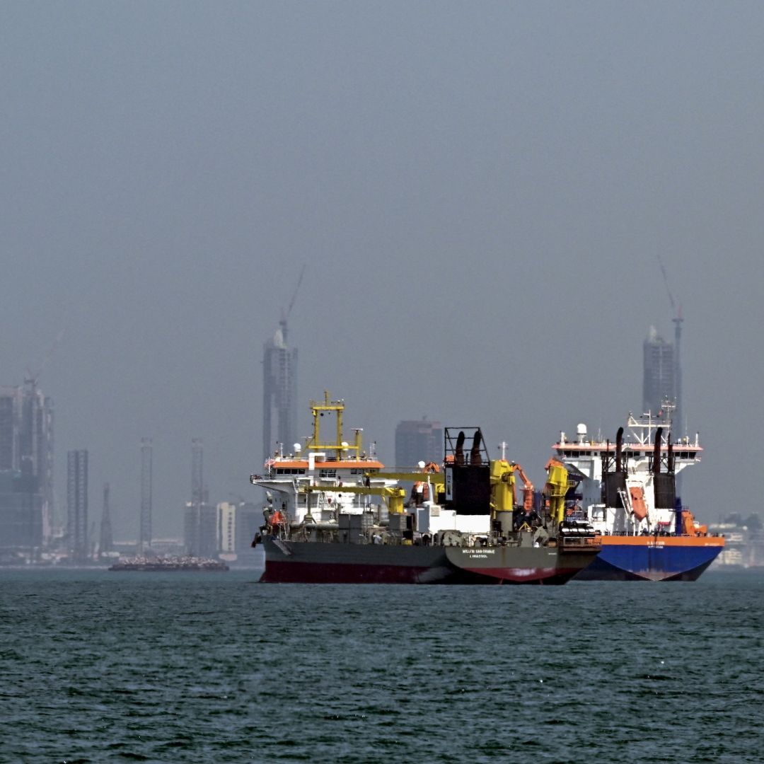 Commercial vessels are pictured offshore in Dubai on March 11, 2026. 
