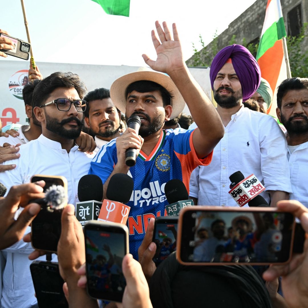 Cockroach Janta Party founder Abhijeet Dipke (center) participates in a protest in Amritsar, India, on June 13, 2026. Cockroach Janta Party founder Abhijeet Dipke (center) participates in a protest in Amritsar, India, on June 13, 2026.