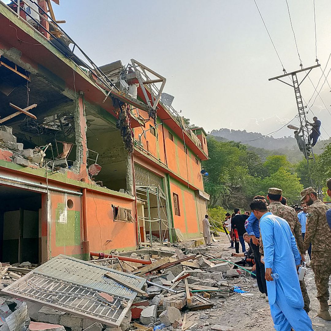 Soldiers and onlookers inspect the debris of a mosque damaged by Indian strikes in Muzaffarabad, the capital of Pakistan-administered Kashmir, on May 7, 2025. Soldiers and onlookers inspect the debris of a mosque damaged by Indian strikes in Muzaffarabad, the capital of Pakistan-administered Kashmir, on May 7, 2025.