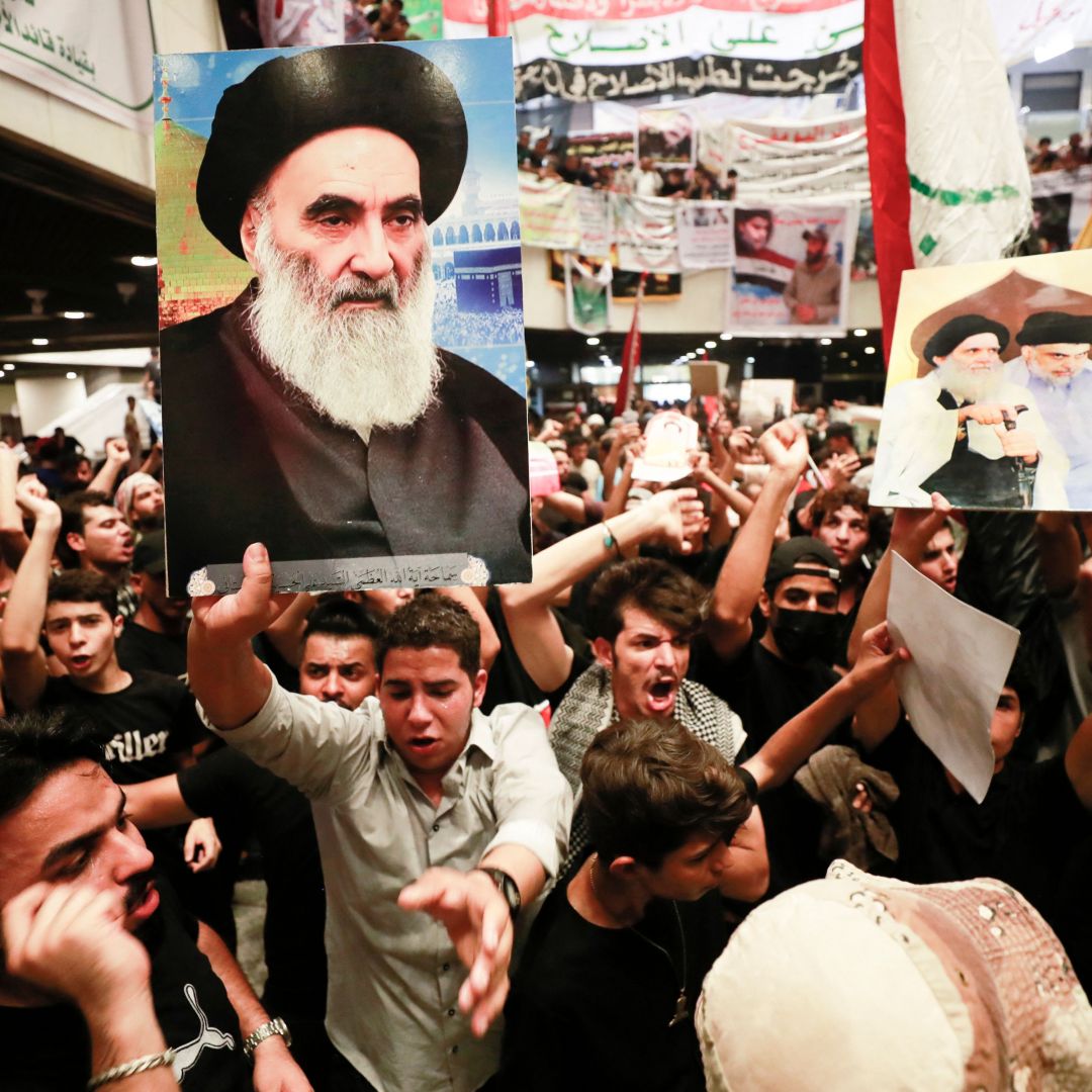 Supporters of Iraqi cleric Muqtada al-Sadr protest the nominee for prime minister from a rival Shiite faction Aug. 3, 2022, in Baghdad's high-security Green Zone. Supporters of Iraqi cleric Muqtada al-Sadr protest the nominee for prime minister from a rival Shiite faction Aug. 3, 2022, in Baghdad's high-security Green Zone.