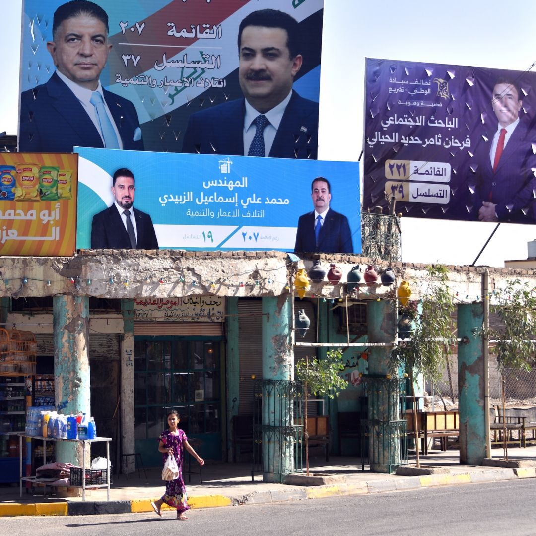 A girl walks past posters and banners depicting political candidates from rival blocs competing for a seat in the Iraqi Council of Representatives in old Mosul, northern Iraq, on Oct. 28, 2025, days before the Nov. 11, 2025, parliamentary elections. A girl walks past posters and banners depicting political candidates from rival blocs competing for a seat in the Iraqi Council of Representatives in old Mosul, northern Iraq, on Oct. 28, 2025, days before the Nov. 11, 2025, parliamentary elections.