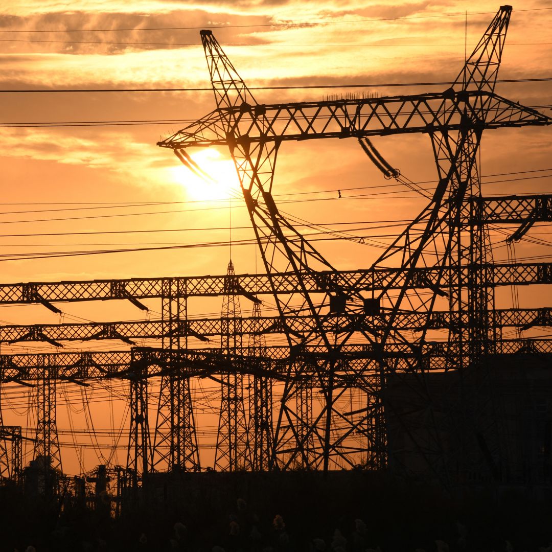 The sun sets behind electrical grids in the southern Iraqi city of Nasiriyah on Jan. 3, 2021. The sun sets behind electrical grids in the southern Iraqi city of Nasiriyah on Jan. 3, 2021.