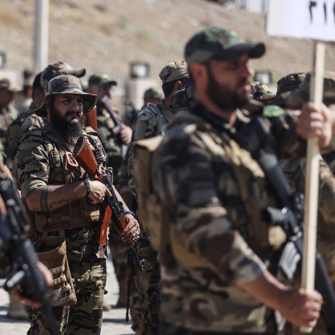 Members of Saraya al-Salam gather during a ceremony in the city of Samarra on June 4, 2026, marking their separation from the Sadrist movement and their integration into the Iraqi security forces.