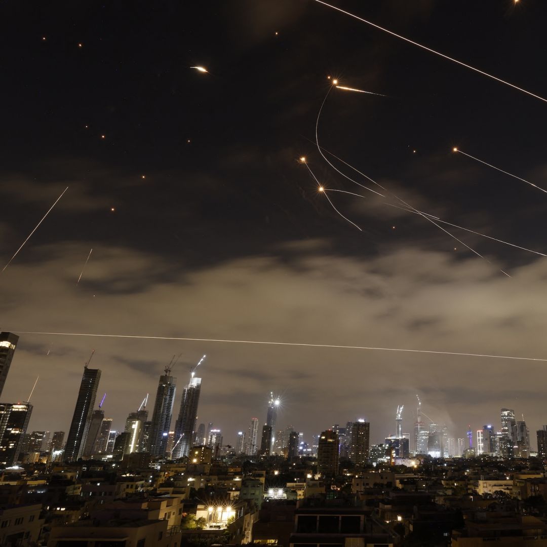 Israeli air defence systems are activated to intercept Iranian missiles over the Israeli city of Tel Aviv amid a fresh barrage of Iranian rockets on June 16, 2025. Israeli air defence systems are activated to intercept Iranian missiles over the Israeli city of Tel Aviv amid a fresh barrage of Iranian rockets on June 16, 2025.