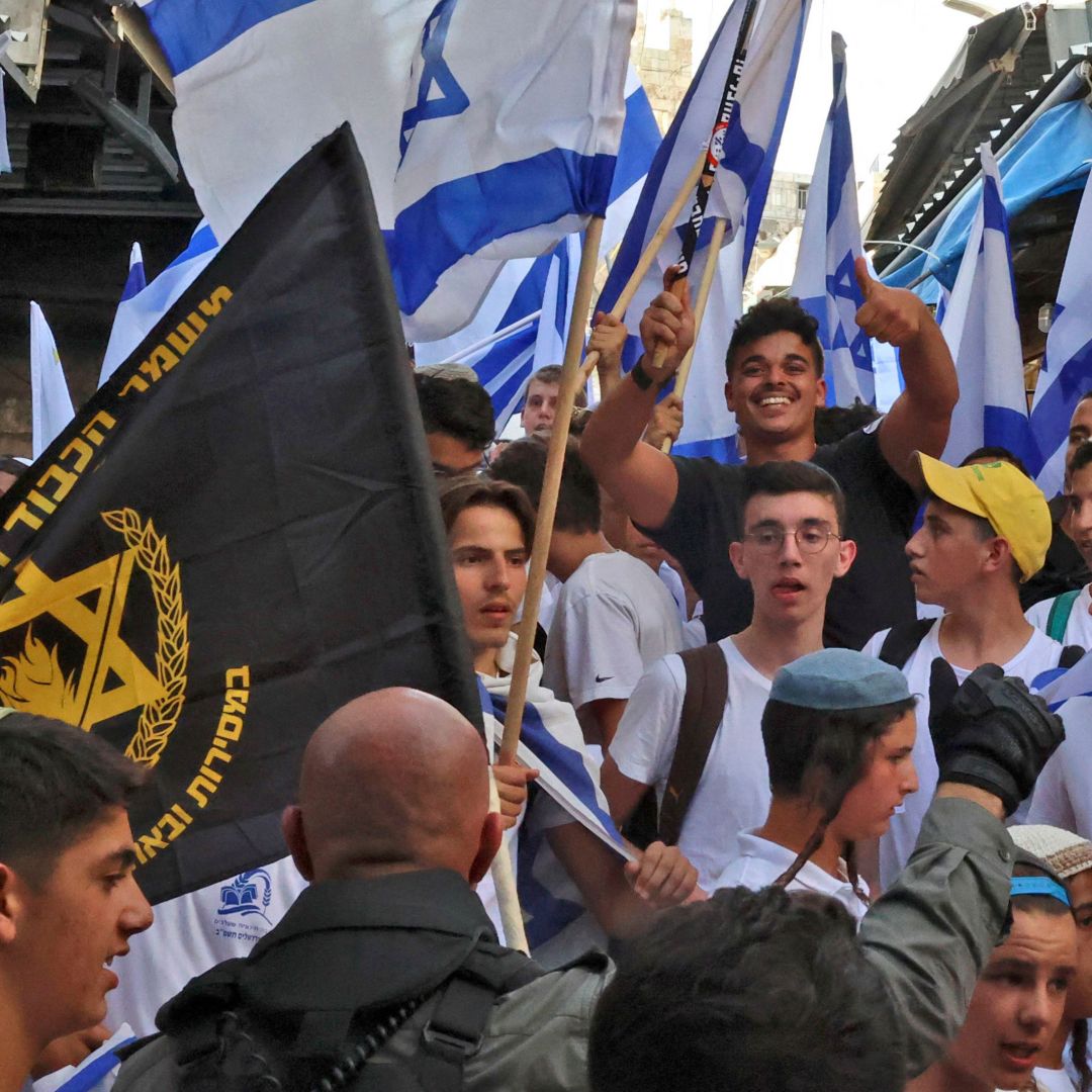 Demonstrators wave the Israeli flag and the banner of the far-right Jewish group "Lehava" (Flame) gather for the "Flag March" on May 29, 2022, marking "Jerusalem Day" in the Old City of Jerusalem. Palestinian attacks and Israeli nationalist rhetoric appear to be increasing Israelis' support for far-right narratives and policies, with notable implications for Israel's national security. Demonstrators wave the Israeli flag and the banner of the far-right Jewish group "Lehava" (Flame) gather for the "Flag March" on May 29, 2022, marking "Jerusalem Day" in the Old City of Jerusalem.