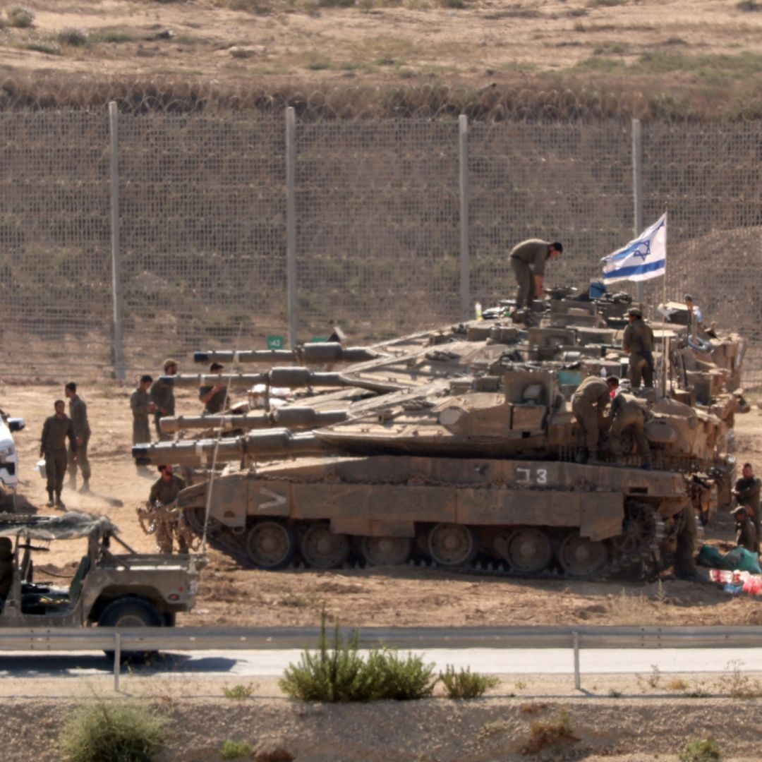 Israeli troops are seen deployed at the border with the Gaza Strip on July 23, 2025. Israeli troops are seen deployed at the border with the Gaza Strip on July 23, 2025.