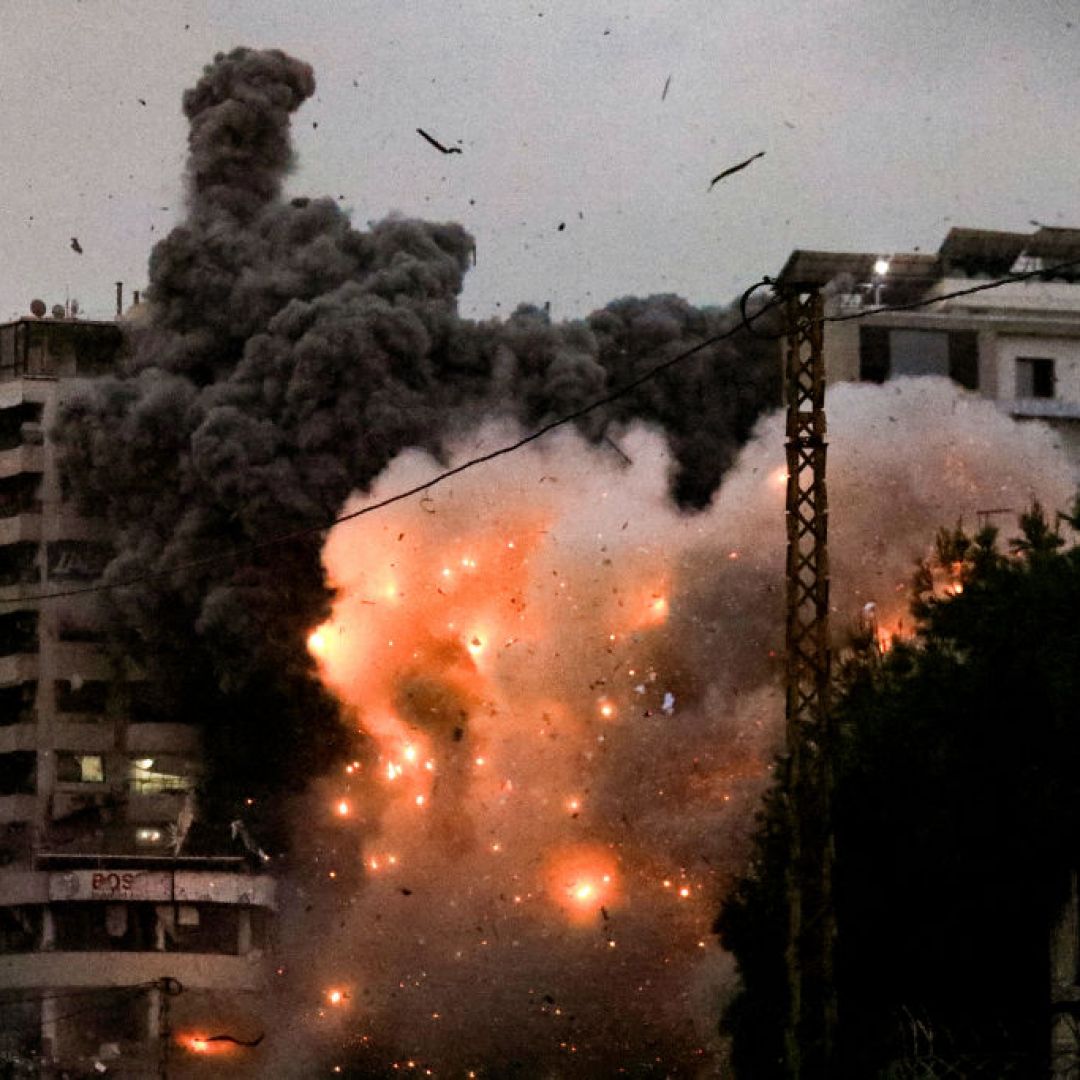 A fireball erupts from the site of an Israeli airstrike that targeted suburbs south of Beirut, Lebanon, on Nov. 25, 2024. 