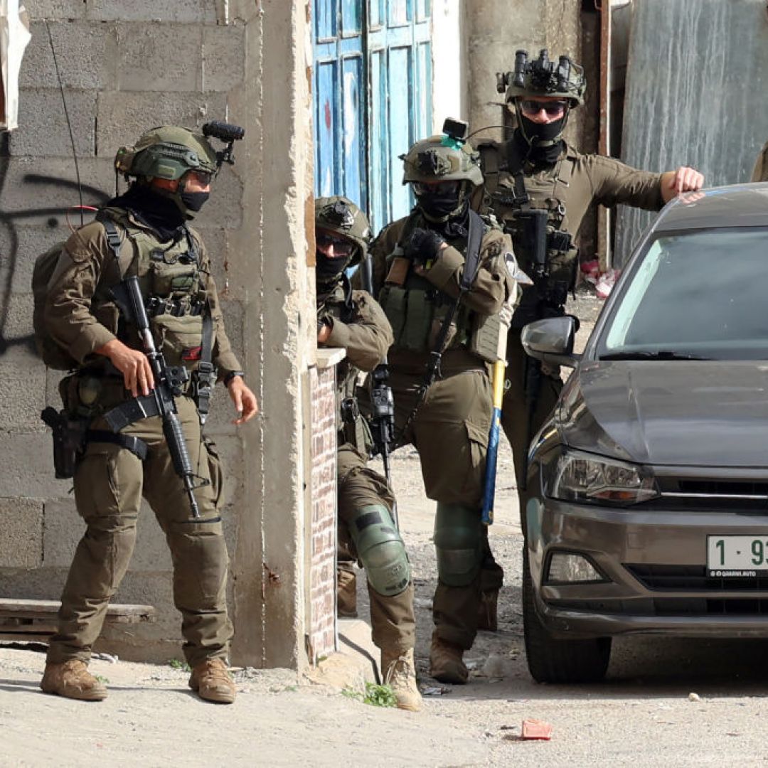 Israeli soldiers conduct a raid in the West Bank on March 19, 2025. Israeli soldiers conduct a raid in the West Bank on March 19, 2025.