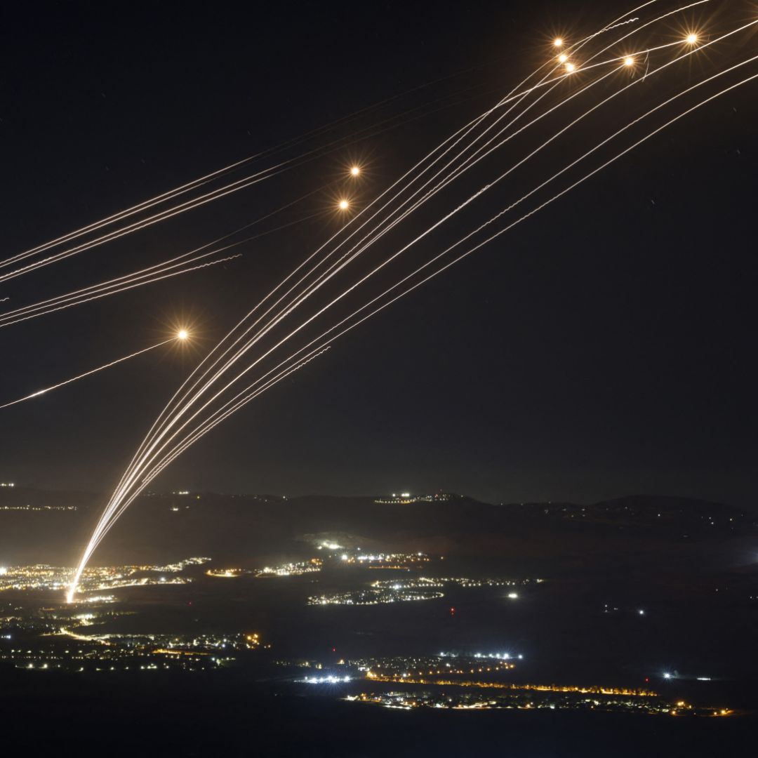 Israel's Iron Dome air defense system intercepts rockets fired from southern Lebanon on Aug. 4, 2024, in the Upper Galilee region of northern Israel.