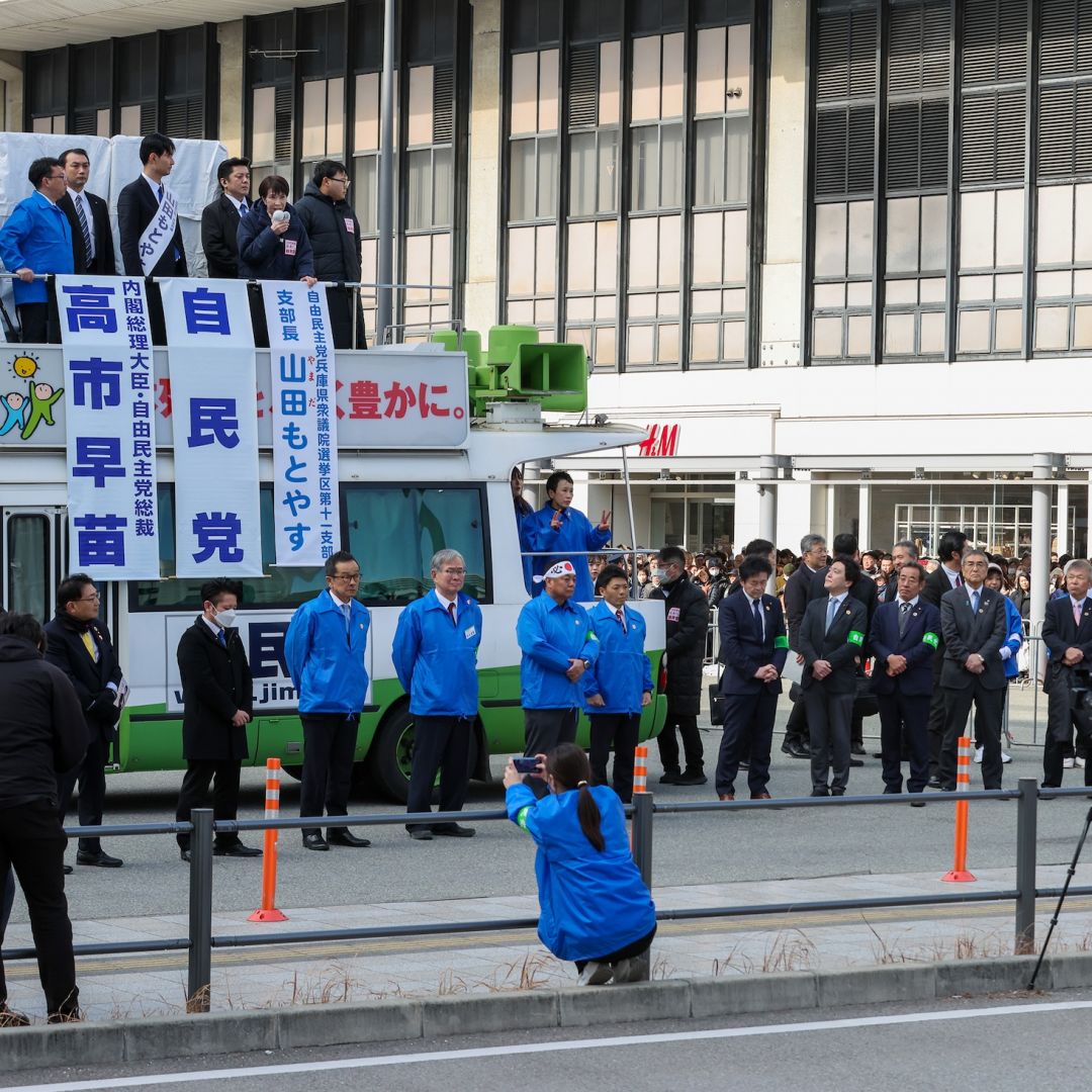 Japanese Prime Minister Sanae Takaichi (top, 5th from left) speaks during the election campaign rally on Jan. 29, 2026, in Himeji, Japan. 