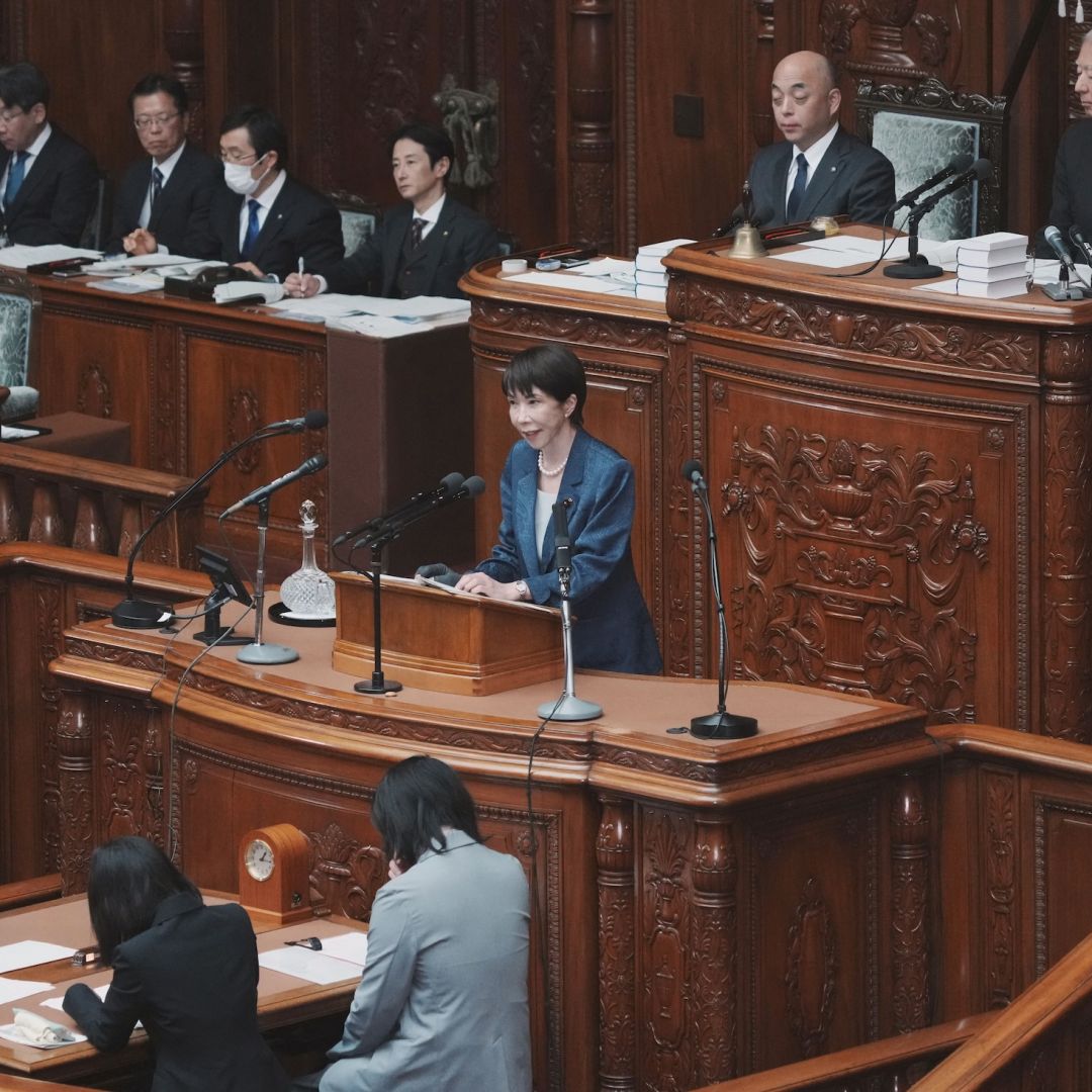 Japanese Prime Minister Sanae Takaichi (C) answers questions during a plenary session of the House of Representatives at Parliament on March 26 in Tokyo.