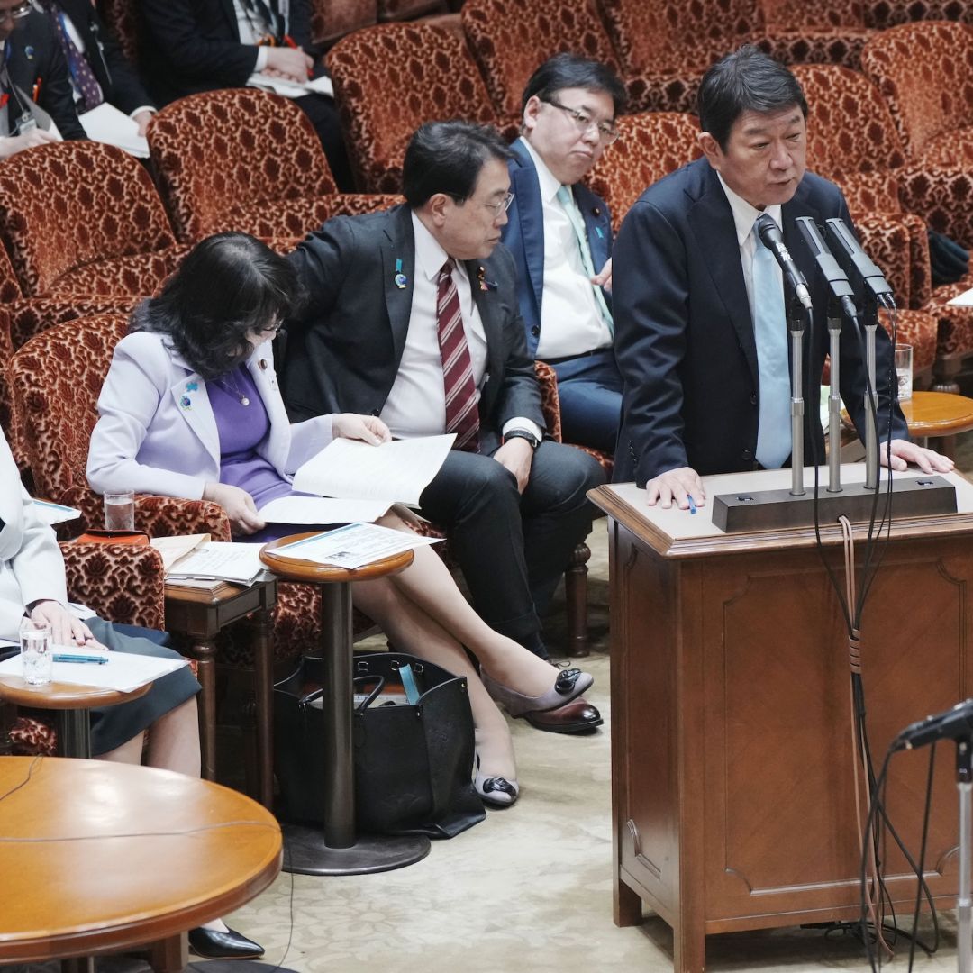 Japanese Foreign Minister Toshimitsu Motegi answers questions at a legislative budget committee session in Tokyo on April 7, 2026, while Prime Minister Sanae Takaichi (left) looks on. Japanese Foreign Minister Toshimitsu Motegi answers questions at a legislative budget committee session in Tokyo on April 7, 2026, while Prime Minister Sanae Takaichi (left) looks on.