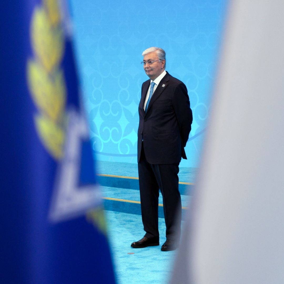 Kazakh President Kassym-Jomart Tokayev waits to greet foreign leaders during the Shanghai Cooperation Organization member states leaders' summit in Astana on July 4, 2024.