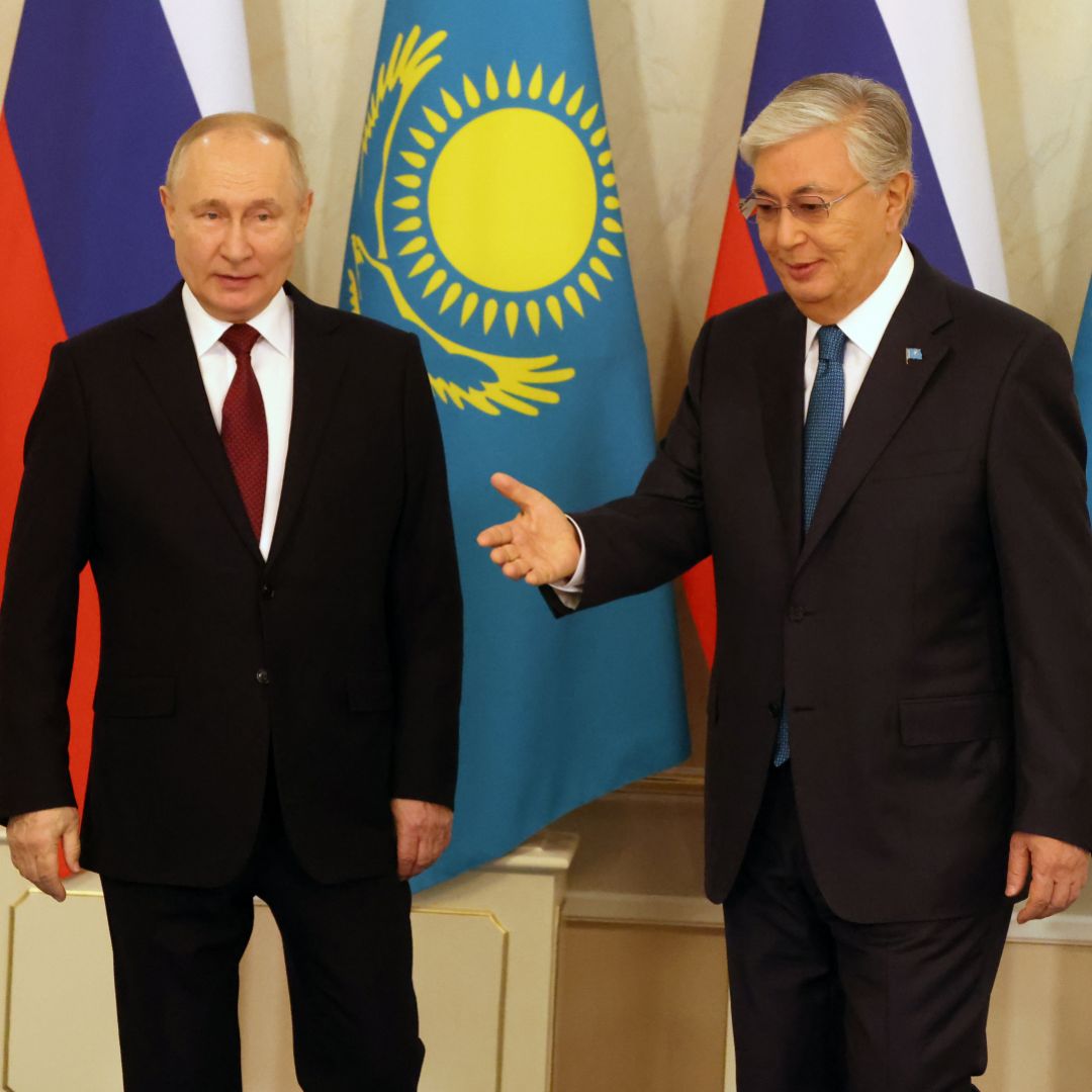 Kazakh President Kassym-Jomart Tokayev (right) greets Russian President Vladimir Putin during their meeting in Astana, Kazakhstan, on Nov. 9, 2023.