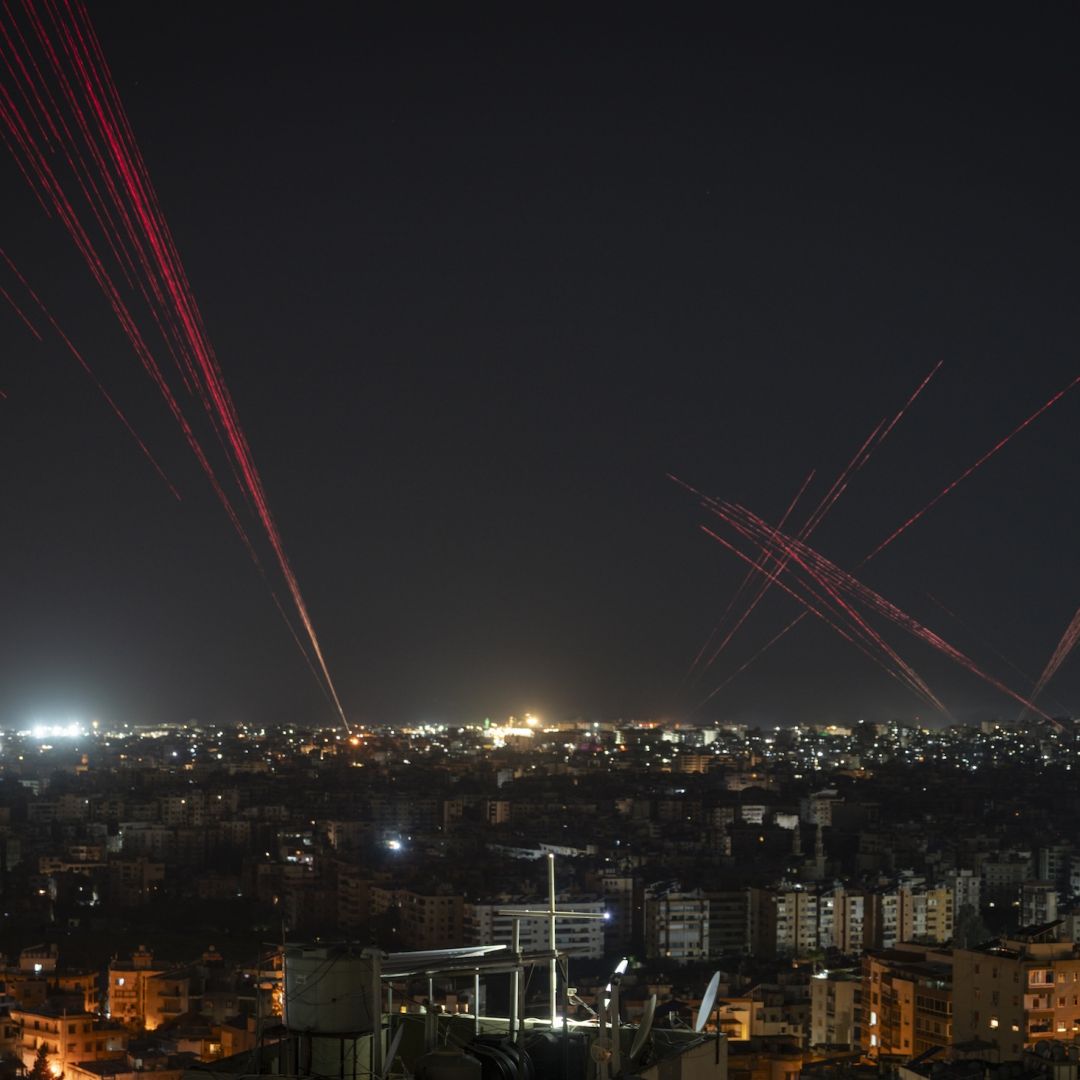 People in Beirut fire bullets into the sky to celebrate the new Lebanon-Israel ceasefire agreement on April 16, 2026. 