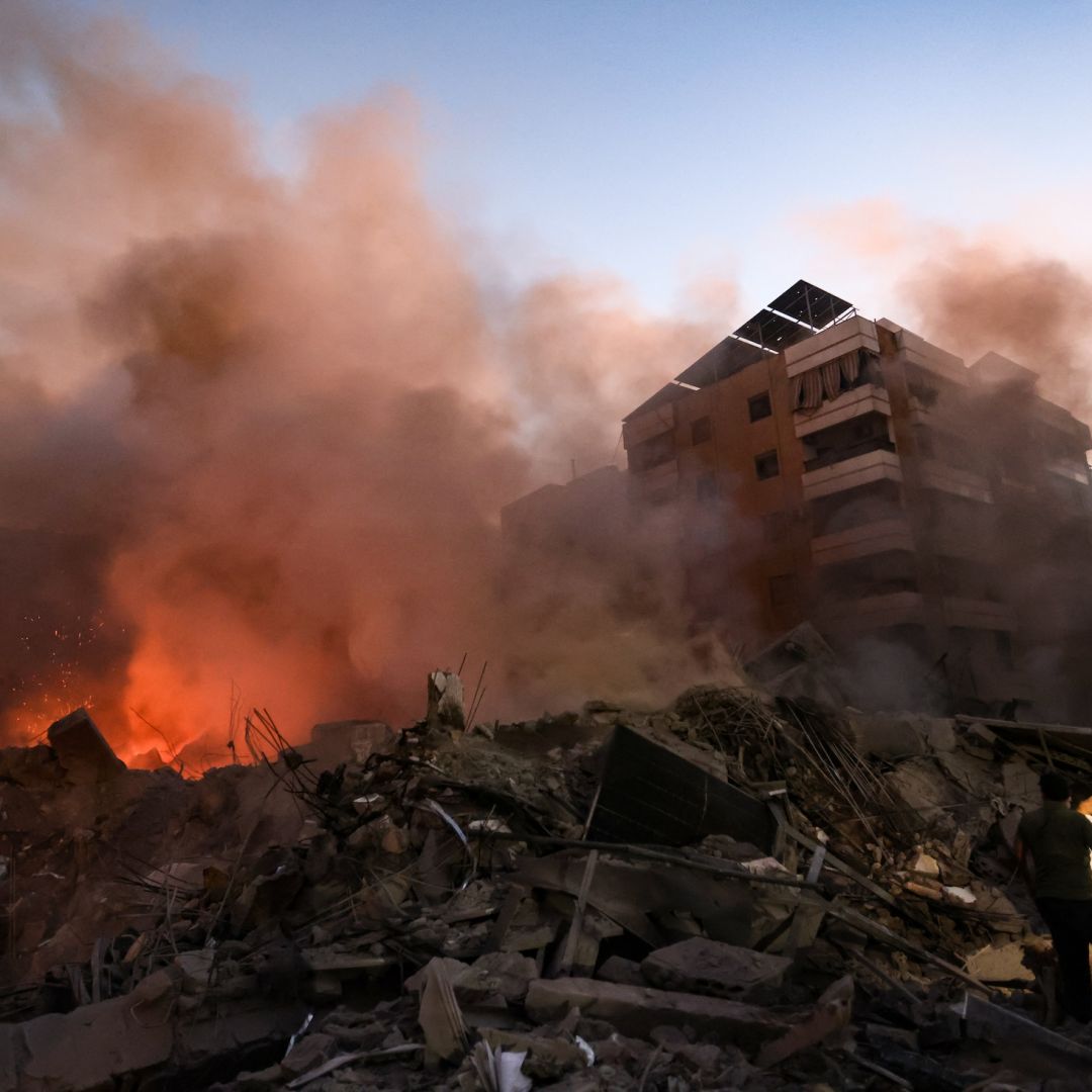 Smoke rises from rubble at the scene of Israeli air strikes in the Haret Hreik neighborhood of Beirut's southern suburbs on Sept. 27, 2024.